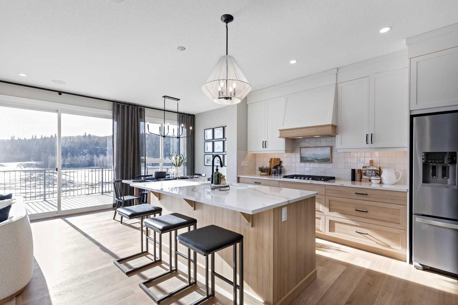 Welcome to this stunning Trico Homes SHOW HOME WITH A LEGAL BASEMENT SUITE, now available for purchase with a guaranteed LEASEBACK! This is one of the most secure and desirable investment opportunities on the market — own a premium show home and enjoy stress-free, reliable monthly income while Trico continues to use the property for sales and marketing. This is NOT a residential tenancy — Trico remains in full care and control of the home throughout the leaseback term. Property Highlights: Professionally designed and fully upgraded SHOWHOME, Premium finishes, designer selections, and expert craftsmanship throughout, Beautifully landscaped, fully completed inside and out, Thoughtfully curated décor & furnishings (if included, depending on agreement), Immaculately maintained by Trico during the entire leaseback. Leaseback Highlights: Trico pays 7.5% – an exceptional return rarely offered in today’s market! Trico maintains full responsibility for: Utilities, Maintenance Showhome care & presentation, Guaranteed monthly payments, Flexible term — Trico maintains use of the home until sales are complete in the community. Zero hassle: Trico takes care of everything while you build equity in a premium asset. Location: Located in the highly sought-after community of Pine Creek, offering a blend of natural surroundings, walking paths, future amenities, and family-friendly living. Perfect For: Investors seeking reliable, hassle-free income, Buyers wanting to secure a future home but delay possession, Anyone wanting a beautifully finished home, kept in show home condition. Don't miss out on this opportunity - visit the showhome today! *Photos are taken from the Showhome and measurements are pulled from builder drawings*