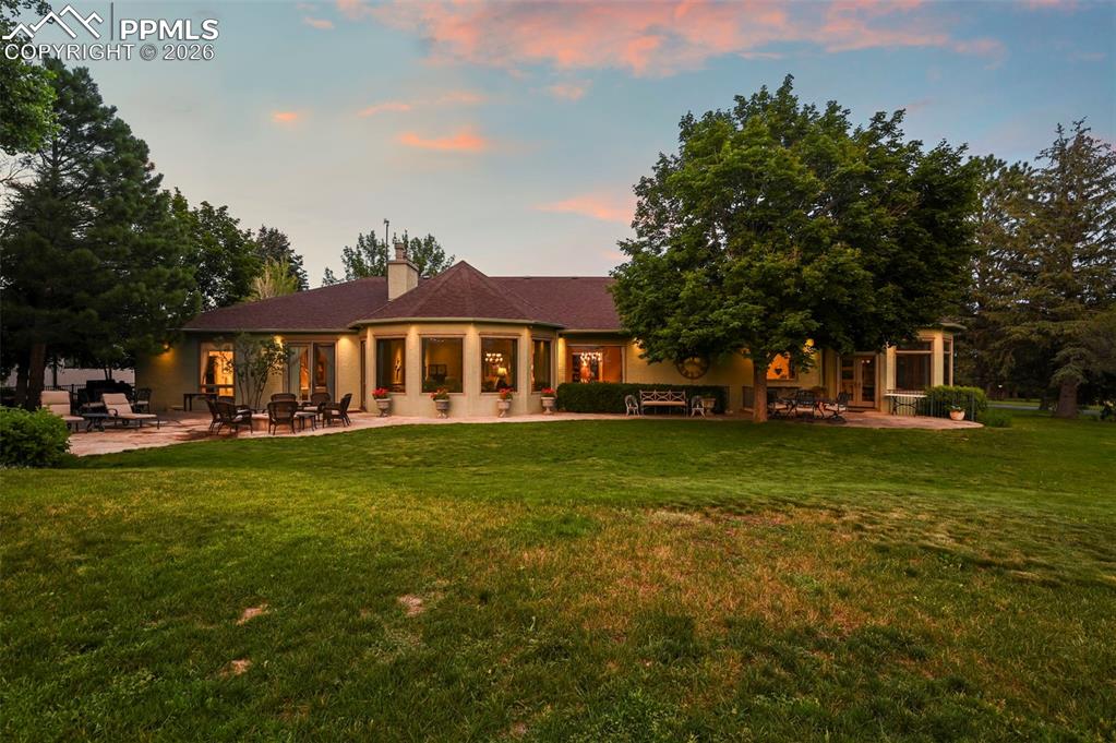 Truly amazing home on one of the most desirable lots in Kissing Camels!  The property is sited on hole #1 of the Kissing Camels North Course with panoramic views of the fairway, Front Range and Pikes Peak.  This home underwent a complete interior remodel with attention to details large and small.  Your buyers can host family, friends or business associates with multiple entertaining areas.  The amazing floor plan details include 5 bedrooms with ensuite bathrooms on the main level with a library, wood-paneled office, butler’s pantry, chef’s kitchen, music room and much more.  On the lower level, there are additional bedrooms with ensuite bathrooms, game room, theatre room and storage.  A unique and exquisite home for the decerning buyer!  Call for your private showing today!