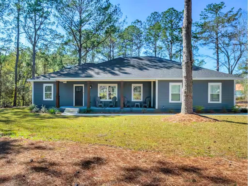 New home for sale close to Cairo, Georgia — the Motocross Capital of the World. You'll be just minutes from Star Racing (Carmichael's Goat Farm) and the Millsaps Training Facility. This elegant and modern three-bedroom, two-bath residence is perfect for growing families or buyers looking for a well-located property near premier motocross training facilities.  Designed with both comfort and style in mind, the home features a spacious layout, a luxurious primary suite with an en suite bath and walk-in closet, and a bright open-concept living and dining area. The modern kitchen comes equipped with updated appliances, and a washer and dryer are included for added convenience. Large windows bring in ample natural light, highlighting the tasteful finishes throughout.  Perfectly located just 20 minutes from Cairo, Georgia, this home is an ideal choice for motocross athletes and families alike. Whether you are training full-time, supporting a rider, or simply want to live near the heart of the motocross community, the location offers unmatched convenience. You are also just 20 minutes from both Tallahassee and Cairo, 15 minutes from downtown Thomasville, and only 12 minutes from the Publix shopping center, providing quick access to groceries, dining, shopping, and essential services.  Whether you're here for competition, training, or simply looking for a comfortable and well-located place to call home, this property offers the perfect balance of modern living and accessibility. There is a 50 amp plug-in for RVs. Schedule a tour today and see all this exceptional home has to offer.