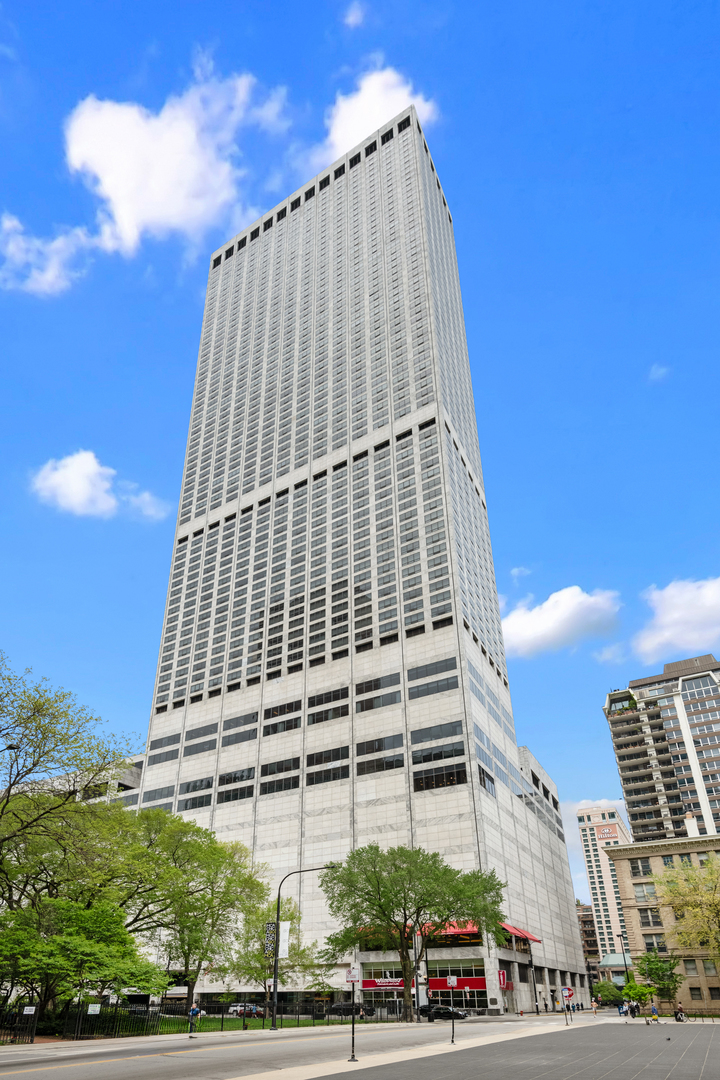 Experience the ultimate in urban luxury in the heart of Streeterville with this completely remodeled 3 bedroom, 2.5 bath masterpiece boasting stunning South views of Chicago's skyline and Lake Michigan. Step into a world of bespoke design and craftsmanship, where every detail, from the back-lit walnut wall concealing the laundry room to the high-gloss black paneling at the entrance, exudes sophistication. Entertain effortlessly in the sleek kitchen with an oversized island, LED-lit quartz countertops, and top-of-the-line Sub-Zero/Wolf appliances. Thoughtfully redesigned open floor plan enhances the spaciousness, while custom-built cabinetry throughout adds to the allure. Retreat to luxurious bedrooms featuring custom designs tailored for comfort and elegance as well as a primary bath featuring Rohl fixtures, a luxurious soaking tub, and contemporary walnut cabinetry. This residence is a MUST SEE! Situated in the prestigious Water Tower Residences, above the Ritz-Carlton, this home offers unparalleled amenities, including direct access to The Carlton Club with its indoor pool, spa, and fitness facilities. Valet and garage parking options are available for convenience. Elevate your lifestyle with this extraordinary residence!