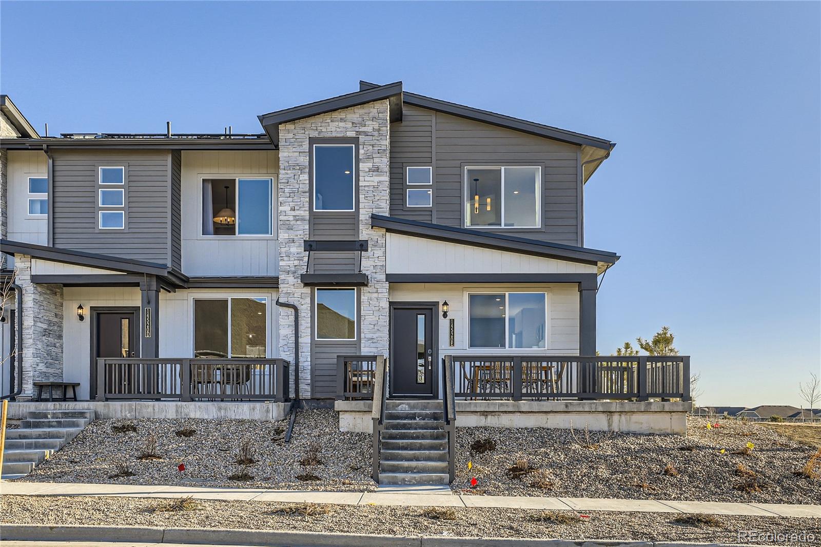 Low maintenance living in the gorgeous new Whisper Village community. Just lock up and go. This former model 2-story townhome in a 5-plex features 2 bedrooms, 2.5 baths, great room, kitchen, upper laundry, loft,  2 car attached garage (rear alley entry) and conditioned crawl space. Gorgeous finishes and upgrades throughout including, slab quartz counters, luxury vinyl plank flooring, stainless steel appliances, *solar and more. The latest in energy efficiency and state of the art technology. Energy efficiency, and technology/connectivity seamlessly blended with luxury to make your new house a home. Amenities abound in this gorgeous community including a rec center, open space, bike/walking paths, shopping, dining and entertainment options.**This home purchase transaction is conditioned upon buyer entering into a Solar Equipment Purchase Agreement or a Solar Equipment Lease with GAF Energy, the forms will be provided to buyer for review. The cost to purchase and lease are approximately $9,792 to purchase or $43.39/month to lease (25 yr term) - see supplements for sample solar contracts, respectively.Special financing not available on this home - it is a resale. Property Sold As-Is. There will not be a property disclosure.  Staging items are not available for purchase.