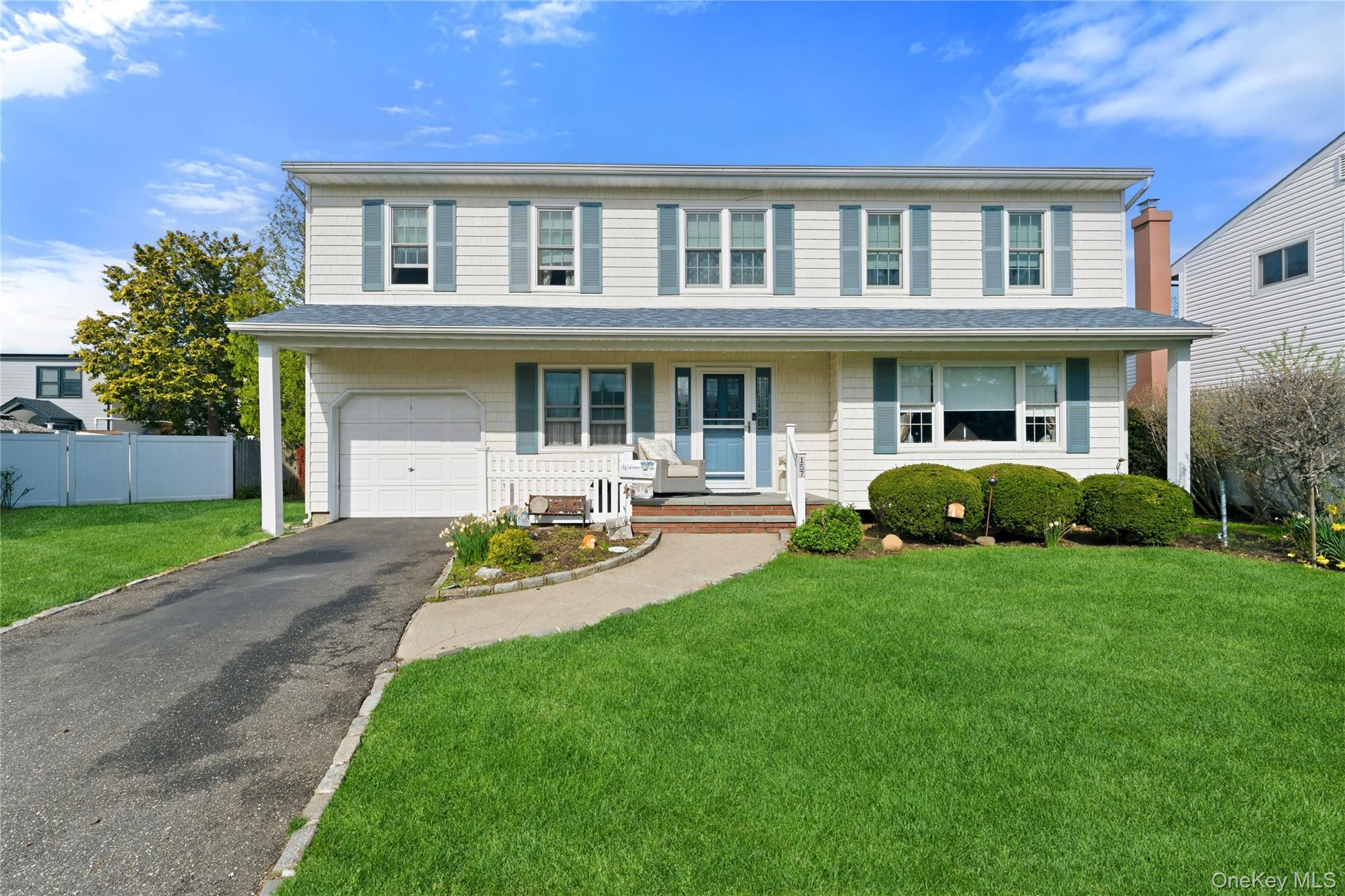 Colonial Home for Sale with 2,648 Square Feet Plus an Attached Garage and Full Basement with West Hempstead Schools Situated in a Cul-De-Sac Just Minutes Away from Garden City. Enter into a Long Entry Foyer with Slate Floors and Double Coat Closet, Living Room with Oak Floors and Crown Molding, Eat-in-Kitchen with Oak Cabinets, Dining Area, Gas Stove, Microwave, Refrigerator Dishwasher into a Formal Dining Room with Oak Floors and Wall Air Conditioner. Laundry Room with Door to Backyard and Den with Oak Floors with Wood Burning Fireplace with Insert and Brick Wall Surround. 2nd Floor Features a Sitting Area at Top of Stairs, Primary Bedroom with Oak Floors, Double Closet, Walk-In Closet, Wall Air Conditioner, and Primary Bath with Shower. 2 More Bedrooms with Oak Floors and Double Closets and 4th Bedroom with Oak Floors and Walk-In Closet. Architectural Roof Replaced Down to Rafters 4 Years Ago. Unfinished Basement with Boiler Area and High Ceiling. House Being Sold in As-Is Condition.