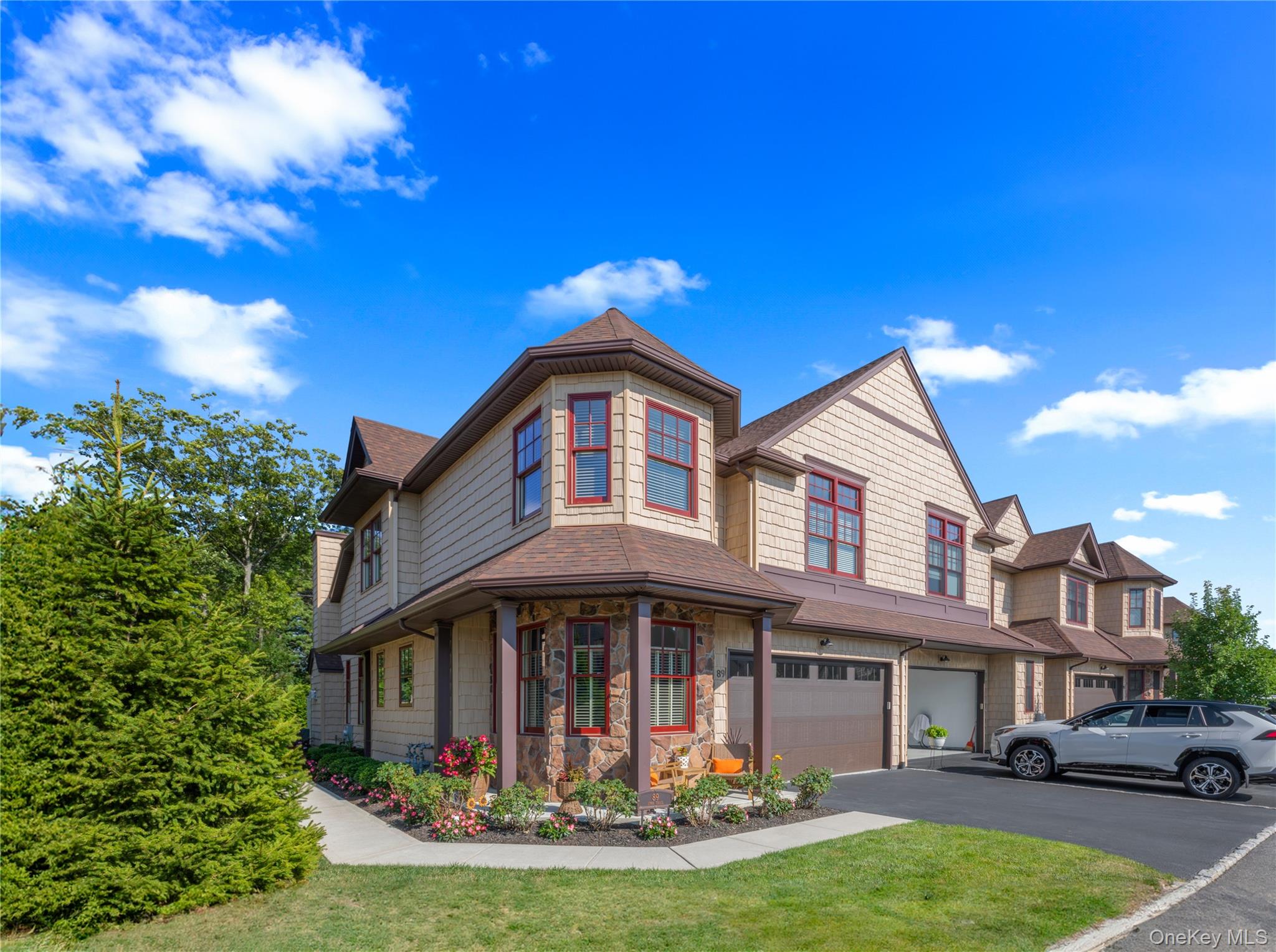 Absolutely stunning, COMPLETELY UPDATED 25'-26', condo in the highly sought-after Bayport Meadows 55+ community. This turnkey townhouse (Amelia Model, Corner) offers 3 bedrooms and 2.5 baths, including a desirable first-floor primary suite.The main level features brand-new ceramic tile flooring throughout, spanning the kitchen, dining room, living room, powder room, primary bedroom, walk-in closet, laundry room, coat closet, and basement landing.The beautifully updated kitchen includes refinished cabinetry, a new backsplash, vented hood range, and a custom-crafted breakfast nook.Designer window treatments elevate the space, including silhouette blinds in the living and dining rooms, and Hunter Douglas wicker blinds with room-darkening features in the primary suite. The luxurious primary bathroom is a true showpiece, featuring Italian marble throughout, a striking mother-of-pearl feature wall, custom StarMark cabinetry, a soaking tub, and high-end Kohler (Calista style) plumbing fixtures, all complemented by elegant crystal lighting.Upstairs, the full bathroom has been completely renovated. Bedrooms feature new carpeting with upgraded padding, and existing wood flooring has been refinished. The loft area is enhanced with new railings and balusters and the basement is fully finished with multiple additional storage closets.Additional upgrades include:Fresh interior paint throughoutTwo forced-air vents added to the basement for heating and coolingFull ductwork cleaning and sanitization (May 2025)Furnace and A/C condenser scheduled for maintenance (April 2026)