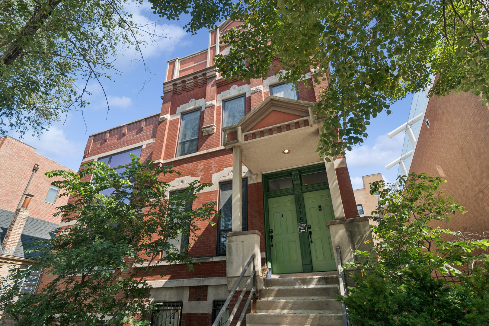 Welcome to this beautifully updated duplex-up, ideally positioned between Wicker Park/West Town! A seamless blend of historic charm and contemporary updates. Step through the front door and be greeted with generously sized living and kitchen areas, dramatic 10' ceilings, and plenty of natural light. The kitchen has refreshed cabinetry, under cabinet lighting, handsome subway style backsplash, new/newer stainless steel appliances, plenty of counter space, large center island with additional storage and comfortable space for seating. The kitchen also features a large and separate sink/wet bar - perfect for entertaining. Downstairs, there are two comfortable bedrooms with generous closet space... including a fully-customized walk-in closet fitted with Elfa closet system. The second full bath has also been refreshed and is conveniently accessible via either direct access from the primary bedroom, or the main hall. The entire home was recently professionally painted, including re-staining of window wells and staircase risers.     Other notable features include: In-unit laundry; Convenient entry/exit from either the first or second floors; one deeded parking space directly behind the building (included in price); Multiple outdoor areas, including a large private deck, and a charming and shared fully-fenced in backyard (perfect for pups). AC unit - 2022.
