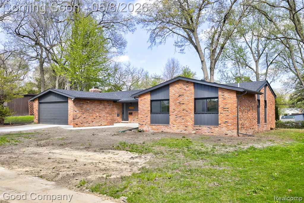 Open house! Saturday, May 9th from 12pm-2pm. Stunning brick ranch in Oak Park completely renovated in 2026 with tons of great details. Bright new open floor plan with soaring vaulted ceilings, and tons of natural light throughout. Covered front porch leads into a welcoming entry foyer with built-in bench seating, cubbies, hooks, and closet space. Open concept main living area boasts a vaulted living room anchored by a striking floor to ceiling brick fireplace and exposed wood beam. Brand new kitchen features two-tone cabinetry, custom tile backsplash, stainless steel appliances, and recessed lighting. Kitchen continues into a vaulted dining space with sliding glass doors to the backyard. Convenient first floor laundry sits down the hallway along with four spacious bedrooms and two full baths. Large primary suite includes its own updated full bath and ample closet space. Finished basement with fresh carpet provides a great additional space for entertaining, hobbies, or extra storage. Fenced backyard with a patio and mature trees, plus an attached two car garage. Welcome Home!
