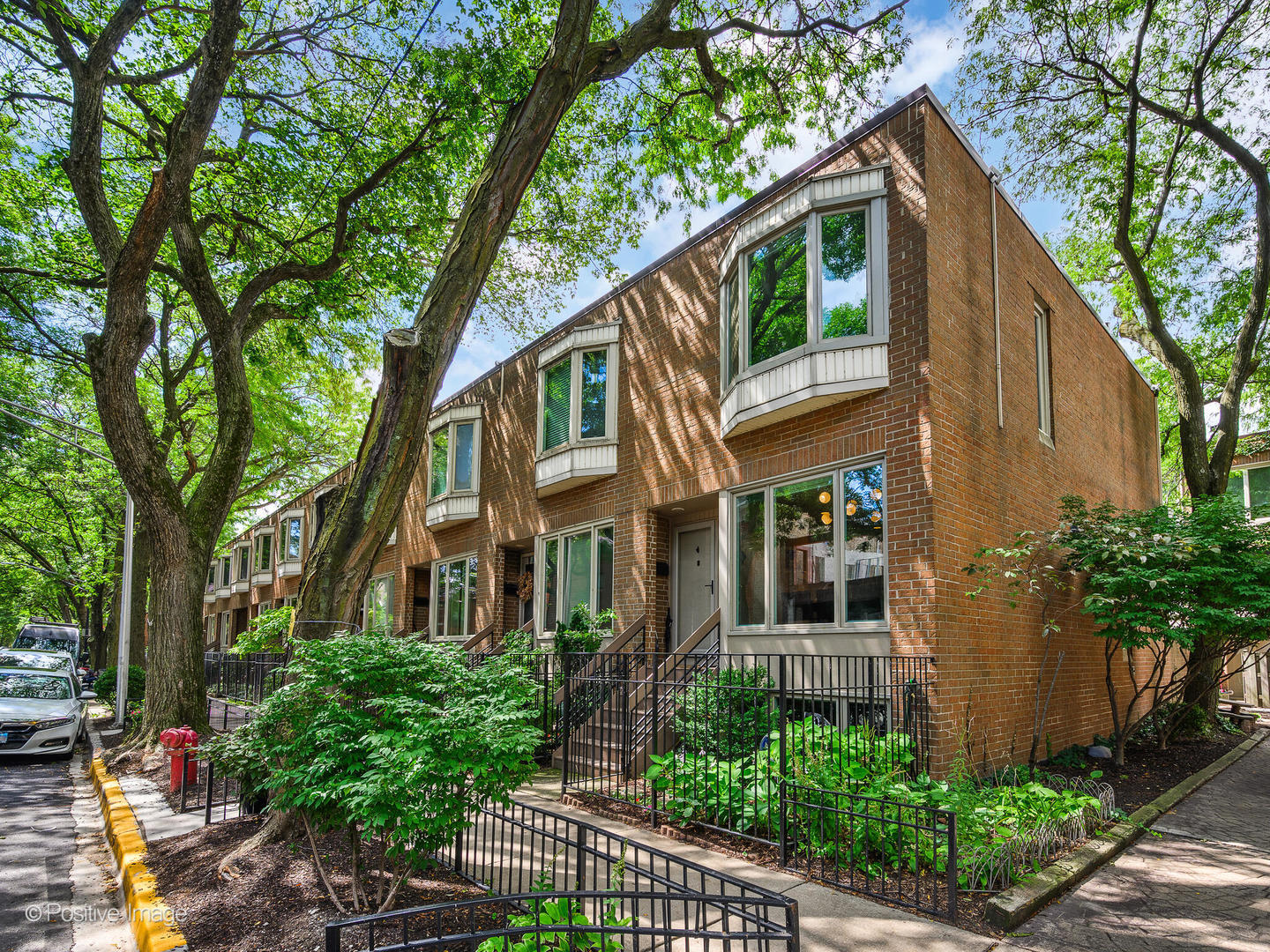 Prime front and end unit with over $200K in updates! Located within the highly sought-after Oscar Mayer school district, this home blends modern design with thoughtful functionality. The newly redesigned main living area offers a seamless flow from the dining room and kitchen to the family room and private patio, creating an ideal space for both everyday living and entertaining. The renovated chef's kitchen features new cabinets, countertops and high-end appliances. The 2nd level hosts the primary suite which features a fully renovated bath with heated floors and a professional closet system. An additional bedroom and a recently updated hall bath complete this space. The lower level features a third bedroom, an updated full bathroom, laundry, and spacious second family room. Additional seller updates include new hardwood floors throughout (2019), custom shades (motorized on the main level), new front windows and all new doors (2019), refreshed exterior with new patio pavers and staircase, and updated mechanicals (2019). One car detached garage included. Short walk to all Lincoln Park amenities including transit, shopping, restaurants, theaters, and parks.