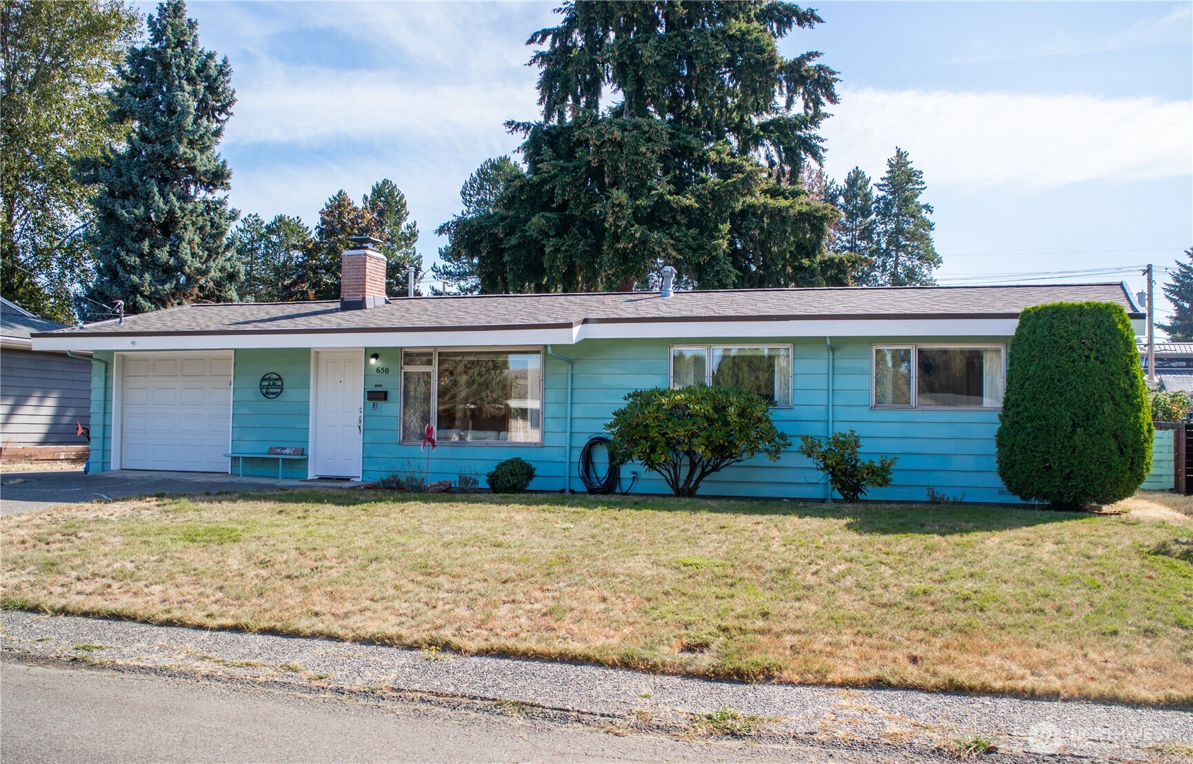 This charming 3-bedroom, 1-bath home located in the heart of the Renton Highlands has so much character and has been lovingly maintained. Highlights include a brand-new roof (2025), remodeled bathroom (2023) and gorgeous original and recently refinished hardwood floors. The bright kitchen has a brand new oven and dishwasher all ready for cooking up delicious masterpieces. Cozy up in the fall and winter by the wood burning fireplace complete with glass doors that can be closed when not in use. The outdoor living is just as fabulous as the inside. The spacious fenced backyard boasts a garden area, storage shed, and a covered patio perfect for summer nights. It has a 1 car garage and plenty of room on the lot to build on or expand. The home is ideally located close to multiple parks, as well as shopping, restaurants, and the bus line. Welcome home!
