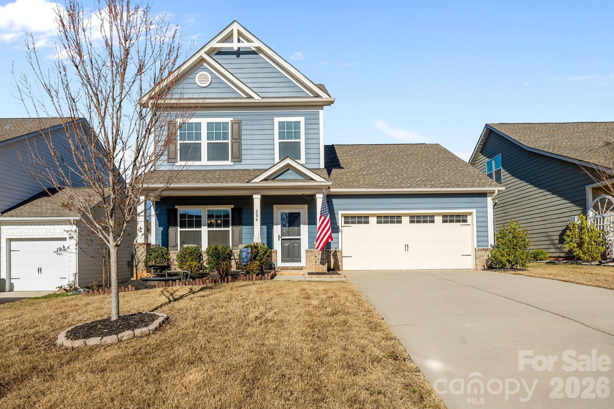 Set in Tillery Tradition, this home offers a relaxed, active lifestyle with access to an 18-hole golf course, clubhouse, restaurant, and pool (membership required), plus Lake Tillery and Lilly’s Bridge just minutes away for easy boating days. A welcoming covered front porch sets the tone as you step inside to an inviting open floor plan. The kitchen anchors the space with custom cabinetry, stainless steel appliances, and an impressive 12-ft quartz bar—perfect for gathering with family and friends. LVP flooring flows throughout the main living areas, while the fireplace creates a cozy spot for cool winter evenings. When the weather warms, the screened-in porch is ideal for enjoying the breeze, and the backyard fire pit creates a natural gathering place for evenings under the stars. The main-level, spacious primary bedroom features an ensuite with a double vanity, a large shower, and a walk-in closet. Owner added crown molding throughout most of main level as well as a stone type accent wall in the dining area and new pendant lighting in the kitchen. Upstairs, you’ll find 2 additional sizable bedrooms, a full bath, and an open loft-style bonus room, along with a large floored unfinished space ideal for storage or future expansion. Situated on a generous 0.4-acre lot, this home offers plenty of space to personalize and enjoy for years to come. Perfectly positioned near Lake Tillery, local vineyards, and the Uwharrie National Forest, and conveniently located about an hour east of Charlotte and two hours west of Raleigh—this is lifestyle living at its best.