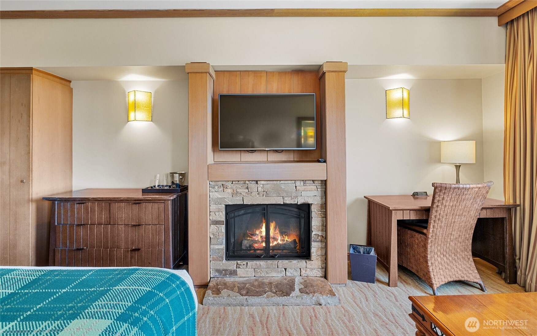 Cozy real stone fireplace.