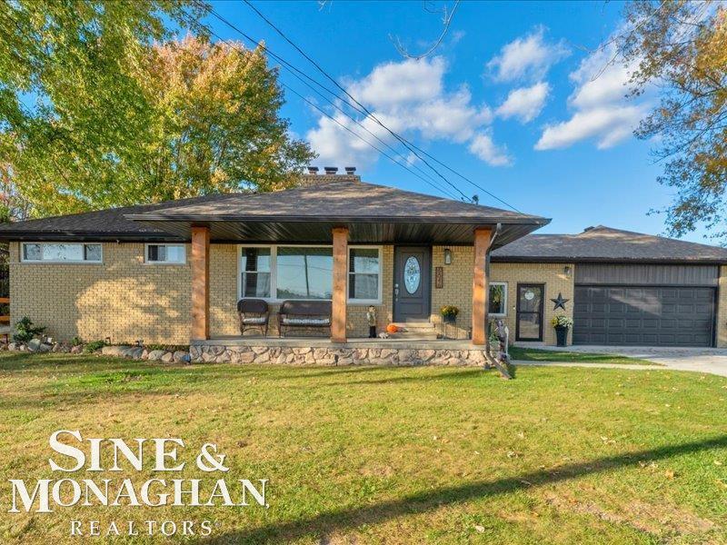 Where do you begin with this ONE OF A KIND (truly) property? 20+ Acres, Gun Range, Barn (converted from 2 stable horse barn) 17x25 with storage loft and electric service, Hay Barn, Cross Bridge, Garden Area, Chicken Coup & a BRAND NEW POLE BARN built in 2022 featuring a CUSTOM made bar area, bathroom, 40x56 with 14' ceilings, 5'' concrete floor, 20'' rat wall, 2'' foam insulation with R11 batt insulation, 16'' blown in insulation (ceiling), exterior lighting on timer, forced air propane heater, brand new pellet stove, 100amp electric service, insulated 14'x12' garage door with heavy duty electric opener, 200' limestone driveway.  All this, and a home too!! This ALL brick ranch sits pristine and fenced off. 3 bedrooms, full bath, full basement and an attached 2 car garage with enclosed breezeway. Natural hardwood flooring throughout, craftsman builtins for the added charm. Updates include: new cement driveway, freshly painted soffits and fascia, new porch pillars, complete kitchen remodel, new appliances (2021), all new light fixtures, new blinds, paint throughout, new interior doors, a saltless water system/softener, the list goes on. You truly have to see it to take it ALL in. Sunsets, bonfires, game days in the barn, hunting, walks, gardening, off roading, target practice, ENDLESS. Do not miss out on seeing this one, especially with the fall colors starting to peak. Grab a thermos full of your favorite beverage and set your showing appointment today.