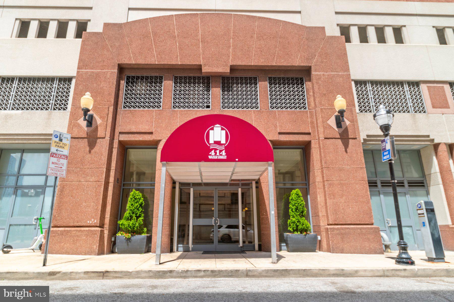 Penthouse-Style Luxury Living at Baltimore’s Inner Harbor.  Welcome to your stunning 3 bedroom, 2.5 bathroom  residence! This beautifully designed condo offers breathtaking views of the Inner Harbor and the Baltimore skyline. Elevated high above the city, this home boasts soaring ceilings, oversized windows, and an open-concept layout that floods the space with natural light.  Corner unit with southern and eastern exposures. The spacious primary suite includes a luxurious en-suite bath and walk-in closet, while the second bedroom and second den provides versatility for guests or a home office. Additional conveniences include in-unit laundry, a dedicated storage unit, and a reserved parking space in a secured garage.All of this AND an ASSUMABLE VA LOAN at 2.75%, with a remaining balance of an estimated $270,000.Located in the prestigious 414 Water Street building, residents enjoy a host of premium amenities, including a rooftop pool, state-of-the-art fitness center, business conference area, multi-functional social spaces, and a professional concierge service available 24/7. This secure elevator building also features on-site management for effortless living.With a prime location in the heart of Baltimore, you’ll be steps from world-class dining, shopping, and entertainment. Enjoy the waterfront, explore Harbor East and Fells Point, savor fresh seafood at Phillips, or catch an Orioles game at Camden Yards. You’re also within a short distance of the University of Maryland, Johns Hopkins Hospital, and Mercy Medical Center, making this residence ideal for professionals. Plus, the nearby Baltimore Farmer’s Market offers fresh local produce and artisanal goods.Monthly Condo fees cover essential services, including parking, common area maintenance, exterior building upkeep, gas, water, trash removal, snow clearance, and all building amenities.Don’t miss out on this rare opportunity to experience penthouse-style luxury living in one of Baltimore’s most desirable locations—schedule your private tour today!