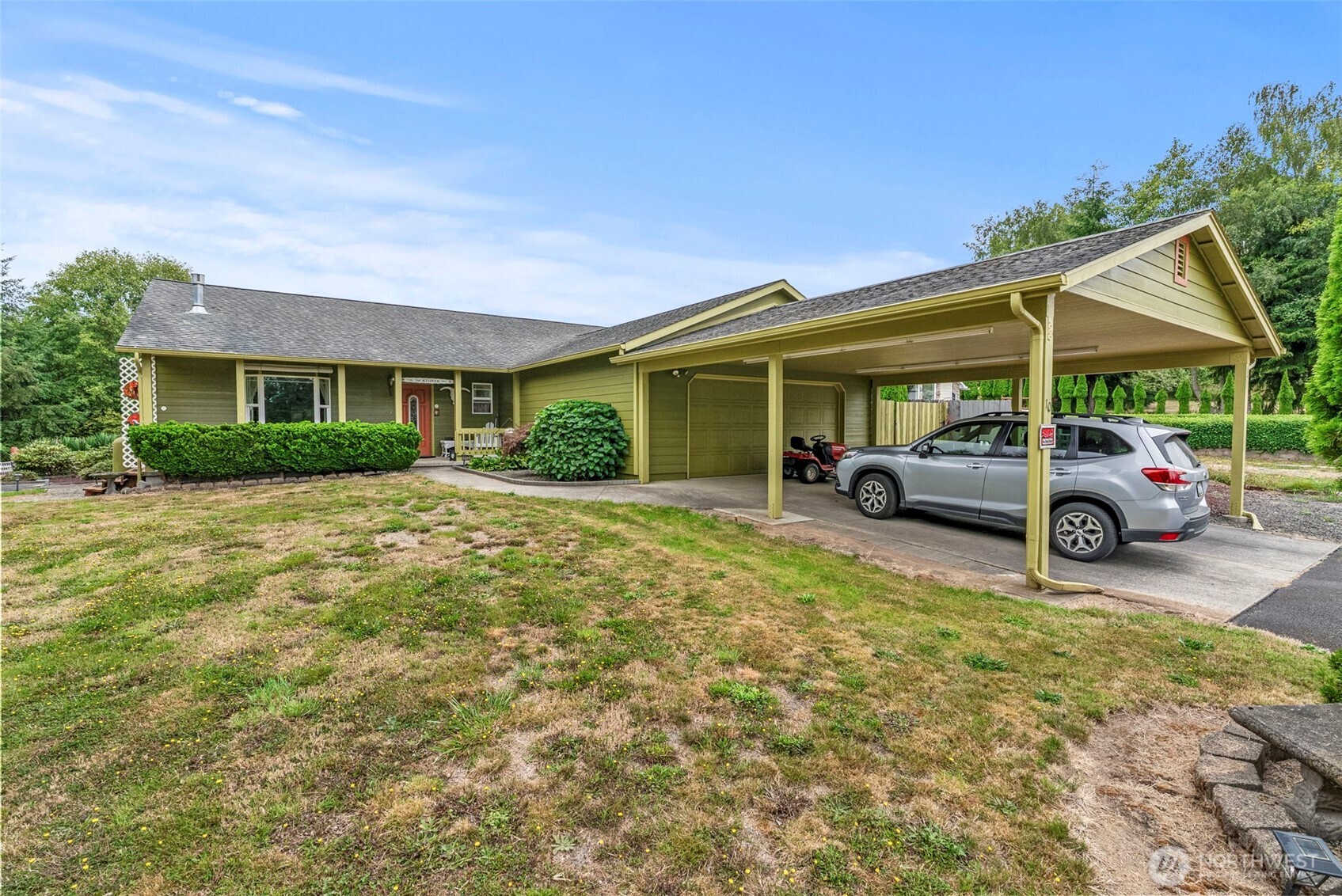 Golf course living with open views and a backyard that looks right out onto the course! Set along a peaceful drive with little through traffic, this home offers a relaxed setting with plenty of space inside and out. Inside, you'll find a comfortable living area, dedicated dining space, and kitchen with stainless steel appliances, along with three bedrooms and two full bathrooms for a practical, functional layout. Step outside to an open backyard with plenty of room to relax, entertain, or take in the view. Established trees along the property create a natural buffer and welcome shade on warm summer days, while a fenced garden area provides a dedicated space for vegetables, flowers, or your next gardening project. A two-car garage and attached carport offer covered parking and additional storage. Whether you're a golfer or simply love the open views, peaceful surroundings, and extra breathing room that come with golf course living, this property is one you'll want to see!