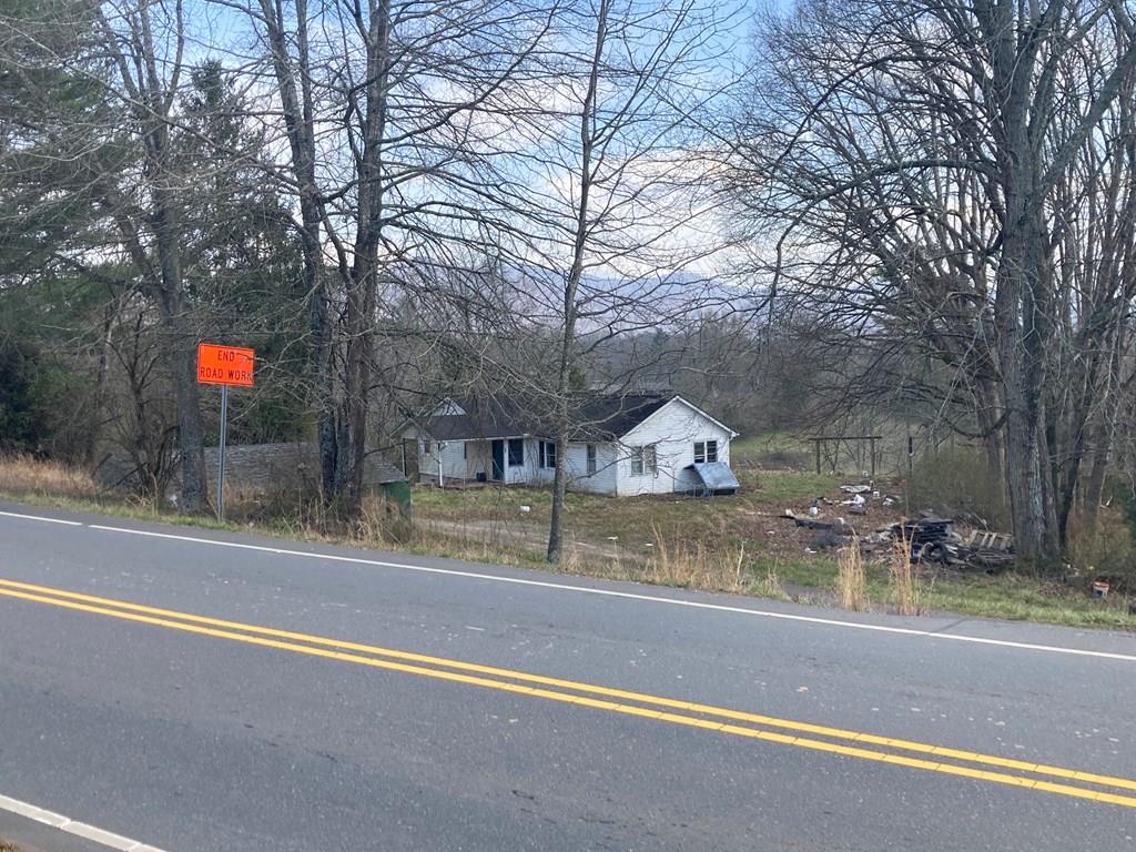 PRICE DRASTICALLY REDUCED $100,000 - Being offered is a a commercial property with endless possibilities. Suitable for apartments, townhomes, restaurants, retail, offices, etc. This 11.14 acre tract is just outside of the Franklin City limits. Located on a busy commercial street with high traffic count. Access to city water and sewer & cable. This is in an amazing location, close to restaurants, Lowes, retail, library, banks, shopping & ramp to Interstate Hwy 64. Being just outside the city limits of Franklin and in a ETJ buffer zone & classified as C2 for any use as long as it is approved by the city of Franklin. Home and barn on property as well, both in poor condition and given no value to price. There is a 3 BR septic that was installed in 1994. Access from both busy Siler road on top and Sunday Dr. on the bottom.