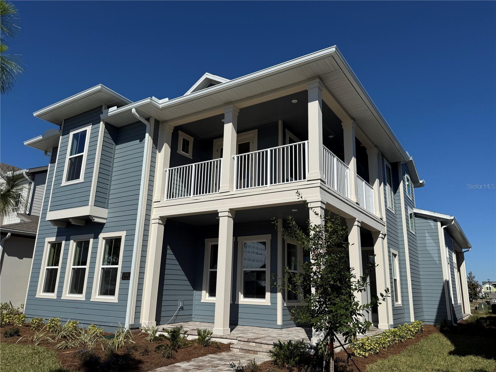 The Fiji, A Masterclass in Modern Luxury and Effortless Living. Welcome to The Fiji by ICI Homes, where every day feels like a private getaway. This 3,100-square-foot residence artfully blends sophistication, flexibility, and warmth designed for those who love to entertain as much as they love to unwind. With four bedrooms, three-and-a-half baths, and spaces that flow with purpose, The Fiji transforms daily life into something extraordinary. Step through the grand foyer into a light-filled living area that opens seamlessly to the outdoors. Expansive sliding glass doors invite the breeze in and extend your living space to a covered lanai that is ideal for alfresco dining, morning coffee, or sunset gatherings under the Florida sky. At the center of it all, the gourmet kitchen shines as both a showpiece and a chef’s dream, featuring premium appliances, a walk-in pantry, and kitchen island perfect for serving, socializing, or sipping wine while dinner simmers. The adjoining dining area creates an inviting setting for casual family meals or elegant evenings with friends. The first-floor primary suite is a sanctuary of calm tucked away for privacy and styled for indulgence. Dual walk-in closets and a spa-inspired bath with dual vanities, a soaking tub, and a glass-enclosed shower turn everyday routines into restorative rituals. Nearby, a versatile flex room adapts to your needs for a home office, study or reading lounge. Upstairs, family and friends will love three spacious bedrooms and a generous game room made for movie nights, laughter, and lazy weekends. The Fiji isn’t just a home. It’s where design, comfort, and connection come together to create a life that feels like luxury every single day.