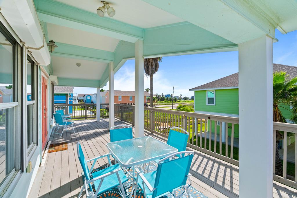 Unbelievable Price! Vibrant and Short term rental READY! Welcome to South Rockport. It's fun,  lively and close to everything. Sandy Pants is an adorable short term rental that is Turn Key for any investor. Three spacious bedrooms and two full bathrooms, this home is the perfect set up. The open living and kitchen has views of the sprawling deck. Guests will enjoy coffee and a coastal breeze. 1224 S Live Oak is a golf cart's ride from the Rockport Public fishing pier, the Rockport Beach, downtown shops and restaurants and everything that this gorgeous coastal town has to offer. This home comes fully furnished with quaint coastal decor. Downstairs there's plenty of parking, even room for your boat and a game of cornhole. If you need storage and want a place to tinker- check out the garage. Come and be a part of the Rockport-Fulton lifestyle with its famous festivals, shopping and dining. New AC system installed with whole house air scrubber!