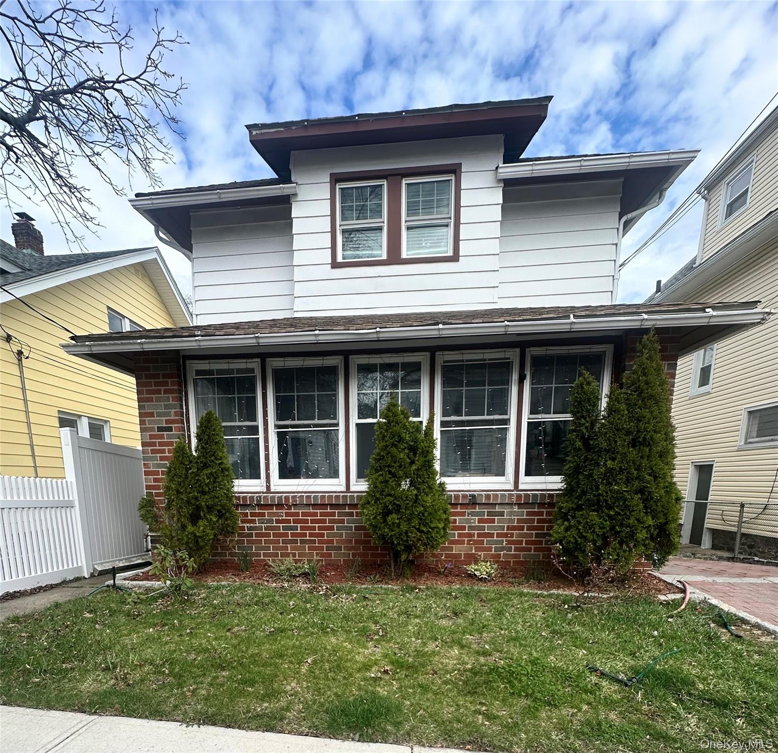 Welcome to this charming and beautifully maintained home.Step into a sun-drenched enclosed front porch, an ideal space for morning coffee, reading, or relaxing in a bright and inviting setting. Inside, the home offers a warm and welcoming layout with abundant natural light, beautifully finished flooring, and a seamless flow between the living and dining areas—perfect for both everyday living and entertaining.The kitchen features stainless steel appliances, modern finishes, and ample cabinetry, creating a space that is both stylish and functional. Additional adjacent space provides flexibility for storage or extended use.Step outside to your private backyard retreat, complete with a spacious deck—perfect for entertaining, outdoor dining, or relaxing under the string lights.Adding even more value, the home has been approved for solar panels, offering an excellent opportunity for future energy efficiency and long-term savings.Conveniently located near shopping, dining, parks, and transportation, this home offers the perfect balance of comfort, style, and accessibility.A true Yonkers gem—move-in ready and full of charm.