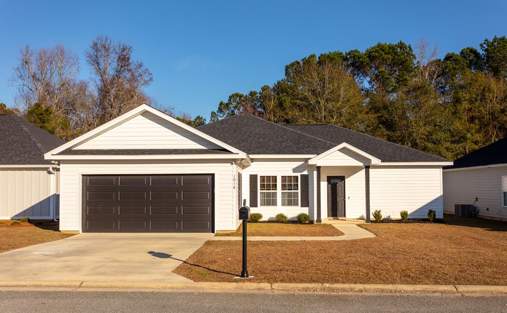 Beautiful Well Kept Cottage - like new,  less than 4 years old. Many upgrades including screened porch, custom outbuilding and privacy fence! Home is low maintenance and easy to care for, all one level with slab construction, hardy board siding with aluminum and vinyl  soffits. . Vaulted ceilings, in living area, breakfast nook, kitchen with granite counter tops, and stainless steel appliances,  true split bedroom plan, with two spacious bedrooms and bathroom, laundry room and garage on one side of the house with luxury primary bedroom and bath suite, featuring walk-in closet and spa like shower on the other side of this very smart floor plan!  In- town location features the security of a small close knit neighborhood with gated access, city water and utilities, secure area to walk with close proximity to restaurants, golf course, grocery store. Express commute to Tallahassee, Bainbridge, and Thomasville all just minutes away. Perfect for first time buyers, those downsizing or those somewhere in the middle! Call today to make an appointment to see this cozy cottage! 24 hours notice required.