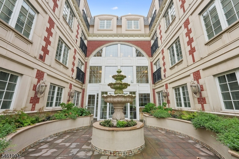 Experience exceptional penthouse living at The Savannah, a premier elevator building in the heart of downtown Westfield. This spacious 2-bedroom, 2.1-bath residence offers approximately 2,615 sq. ft. of sophisticated living space, plus a spectacular wraparound balcony with beautiful town views.The thoughtfully designed interior features a luxurious private office, fabulous walk-in closets in the primary suite, and an impressive laundry/storage room. The gourmet kitchen is equipped with premium Viking appliances, while Pella windows and a stunning onyx powder room add elegance and quality throughout.The Savannah offers concierge service, a private landscaped courtyard, elevator access, and a private heated garage in the secure underground parking area.Perfectly positioned in vibrant downtown Westfield, this exceptional residence is just steps from renowned restaurants, boutique shopping, cafes, and convenient transportation to New York City. A rare opportunity to enjoy spacious, luxurious penthouse living with every convenience at your doorstep.