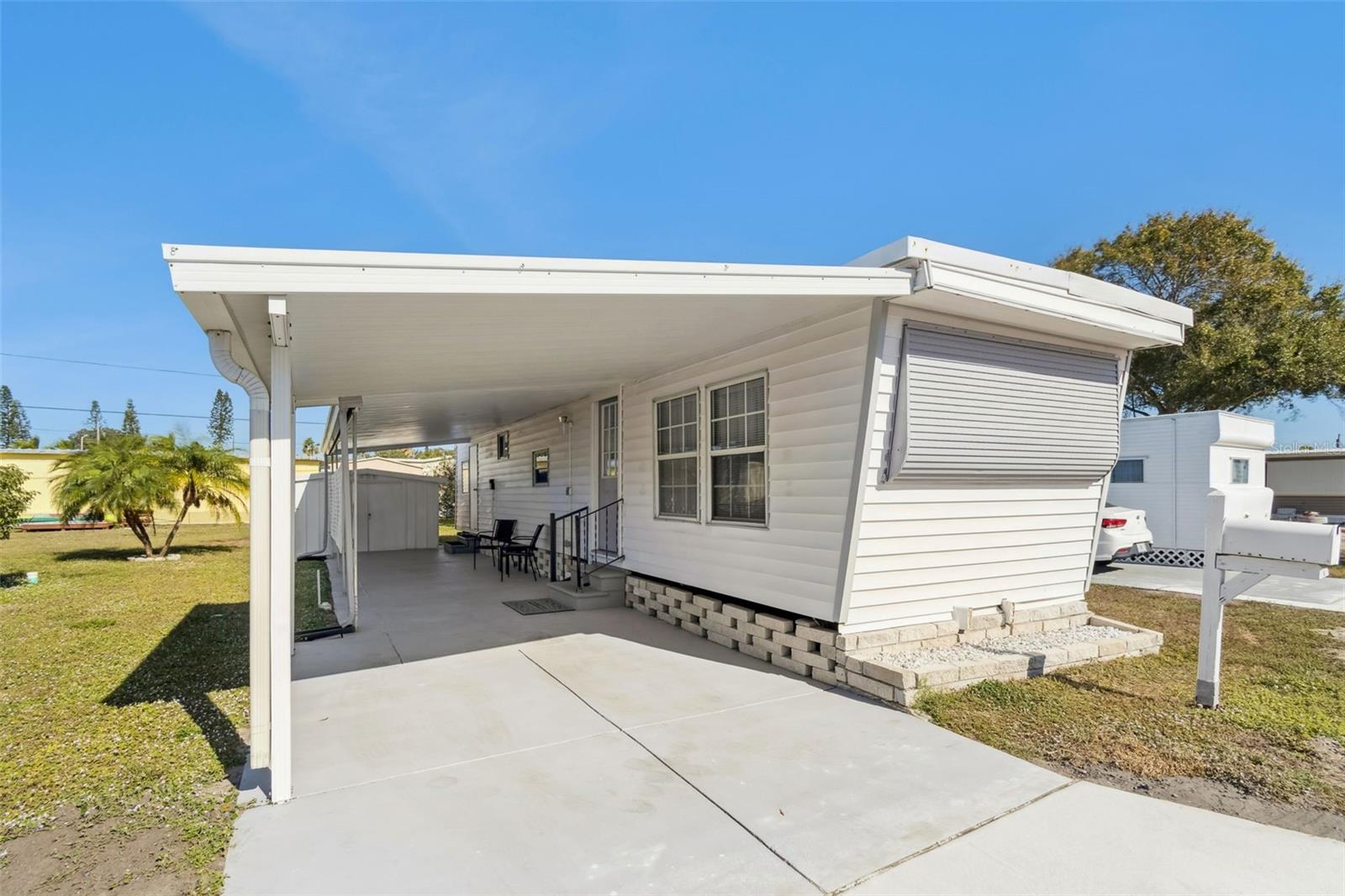 Welcome to Midway Am/Can, a desirable 55+ mobile home park cooperative where ownership includes a share in the community. This beautifully maintained 1-bedroom, 1-bath home is ideal for seasonal or year-round residents. The community offers a welcoming clubhouse, shuffleboard courts, and an on-site laundry facility. A functional storage shed provides convenient extra space.Midway Am/Can is currently undergoing an extensive beautification process. The City of Largo’s new sewer project is nearing completion and will include newly paved roads and driveways. The community has recently added a charming outdoor bistro area, with future updates planned for the clubhouse and shuffleboard courts. Ideally located close to shopping, restaurants, and Gulf beaches, this home offers comfort, convenience, and an active lifestyle in a well-cared-for community.