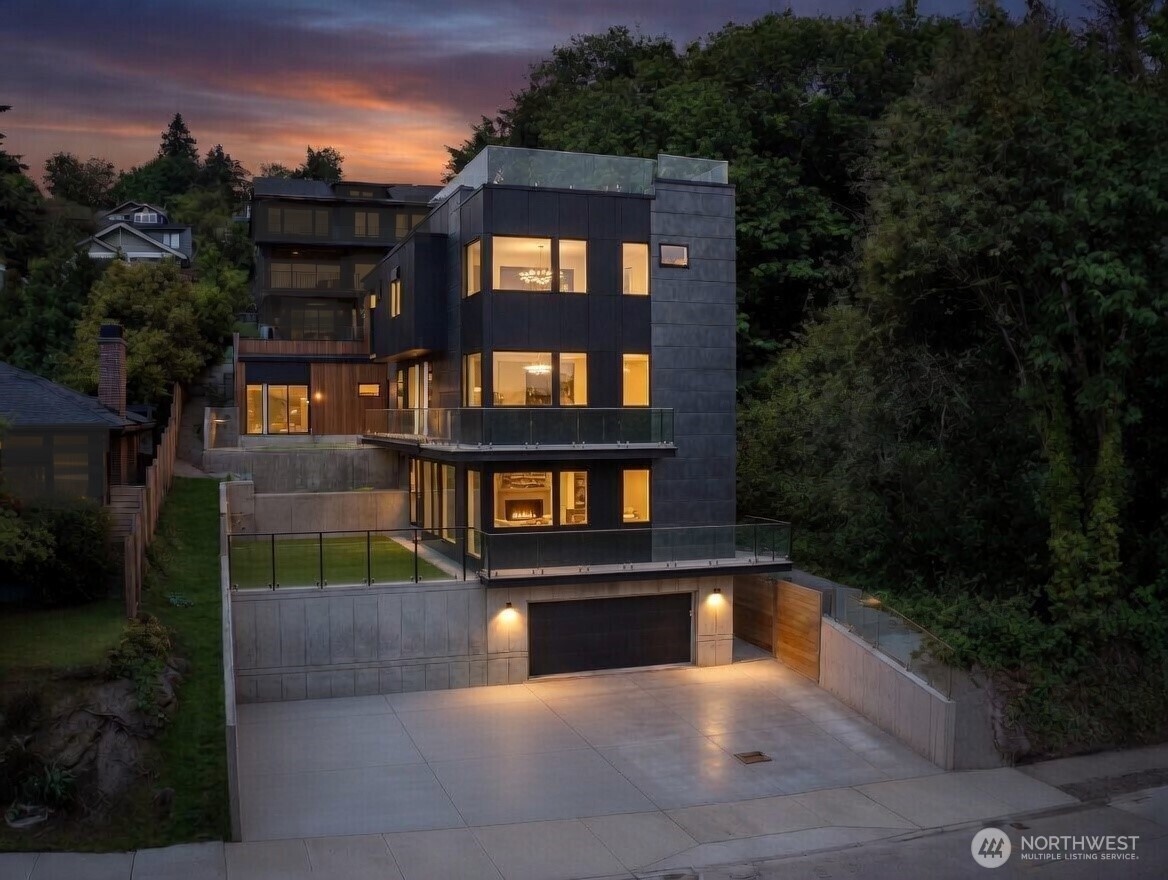 Rare opportunity to own a substantial multi-residence property in Seattle’s coveted Mount Baker neighborhood, thoughtfully designed to capture sweeping Lake Washington and Mt. Rainier views from every level. The main residence, accessory dwelling unit, and detached home, create exceptional flexibility for multi-generational living, guest accommodations, nanny quarters, or income-producing rental opportunities. Expansive outdoor entertaining spaces and a spacious, functional layout make this property ideal for both everyday living and large gatherings. Natural finishes, extensive A/C, abundant storage, huge pantry, rec room with attached bath, and four bedrooms on the same level provide all the right spaces. A unique opportunity for this neighborhood. Enjoy parking for five vehicles with a two-car garage plus three additional off-street spaces. Scale, versatility, and unforgettable views in one of Seattle’s most sought-after neighborhoods.