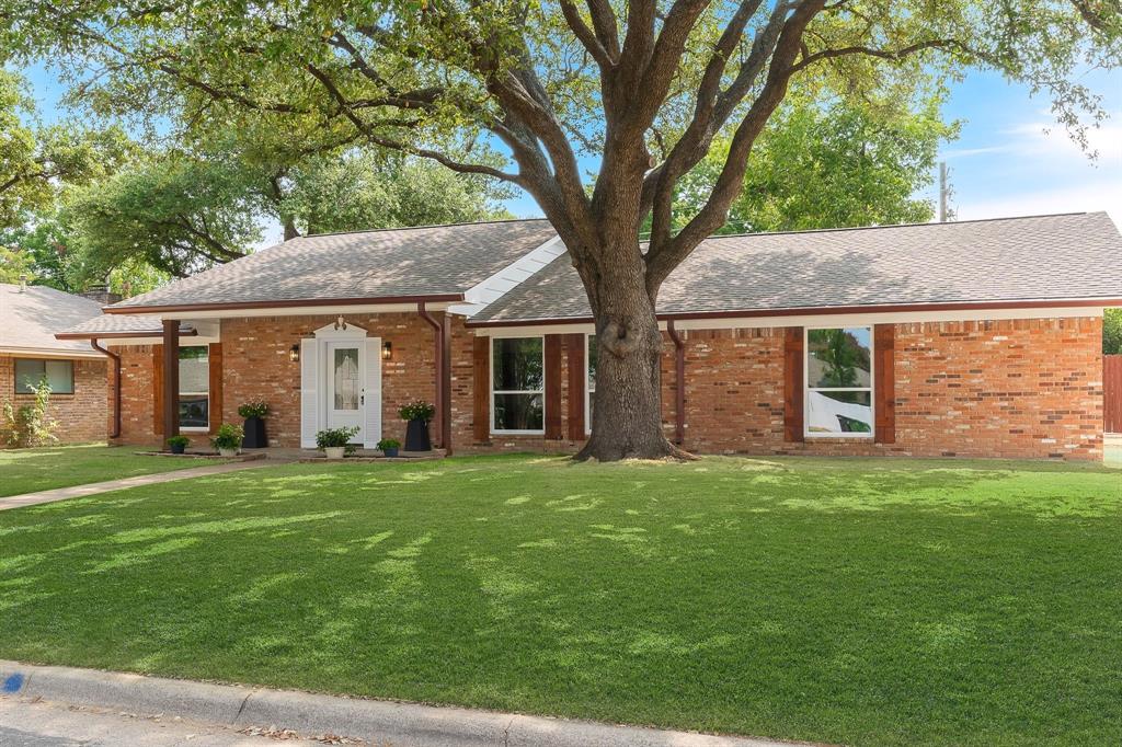 BACK ON THE MARKET! Buyer's financing fell through, but repairs have been completed! Brand new insulation in the attic, combined with the existing radiant barriers on the roof, this home will stay cool throughout the triple digit summers! Welcome to this beautifully updated home in the highly sought-after Lakewood subdivision of Arlington! Perfectly positioned directly across from Hill Elementary and Duncan Robinson Park and Playground, this home offers the ideal blend of modern updates, flexible living space, and an unbeatable location. Step inside to discover stylish ceramic tile and luxury vinyl plank flooring that flows throughout the home, creating a bright and contemporary feel. The remodeled kitchen is designed to impress with sleek quartz countertops, stainless steel appliances, and ample cabinet space—perfect for everyday living and entertaining alike. Featuring two spacious living areas, this home offers endless possibilities. Create the perfect, home office, playroom, or additional flex space to fit your lifestyle. Major upgrades include a tankless water heater for enhanced energy efficiency and endless hot water, brand new breaker box, and plumbing has been updated to PVC! Outside, you'll find an oversized backyard built for both work and play. A large workshop provides incredible space for hobbies, storage, or projects, while the convenient side gate offers additional parking for a boat, trailer, or recreational vehicles. With plenty of room to relax, entertain, or customize your outdoor oasis, the possibilities are endless. Located in one of Arlington's most desirable neighborhoods, this move-in-ready home combines thoughtful updates, exceptional functionality, and a prime location close to parks, schools, shopping, dining, and major highways. Don't miss your opportunity to make this Lakeview gem your next home!