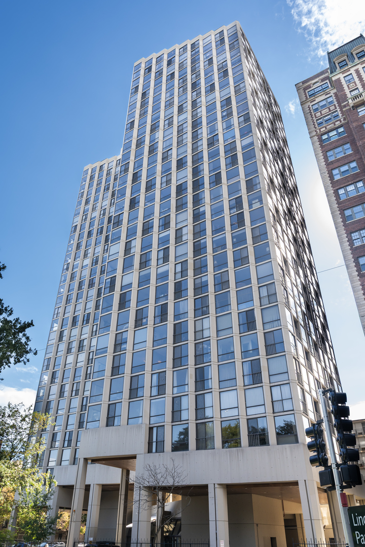 Three condos have been seamlessly combined to create a spectacular 3,350 sq. ft. four-bedroom residence showcasing world-class views of the lake, park, and skyline. This striking contemporary home features a clean, modern design with exceptional flow and generous, flexible living spaces-all framed by floor-to-ceiling windows capturing breathtaking panoramas. Polished concrete and hardwood floors, European-style baths, and designer lighting elevate the aesthetic throughout. The northeast corner living and dining area offers a fireplace, custom built-ins, electric shades throughout and stunning natural light. The chef's kitchen impresses with Leicht cabinetry, Thermador induction cooktop, Bosch dishwasher, Dacor ovens, a breakfast bar, and ample space for a dining table.The luxurious primary suite includes a custom walk-in closet and spa-like bath with wall-mounted Duravit sinks, airjet soaking tub, and steam shower. Additional highlights include three more bedrooms and baths, a family room, a den/office, and in-unit laundry. Valet and self-parking available. Ideally located within the highly sought-after Lincoln Elementary School District.