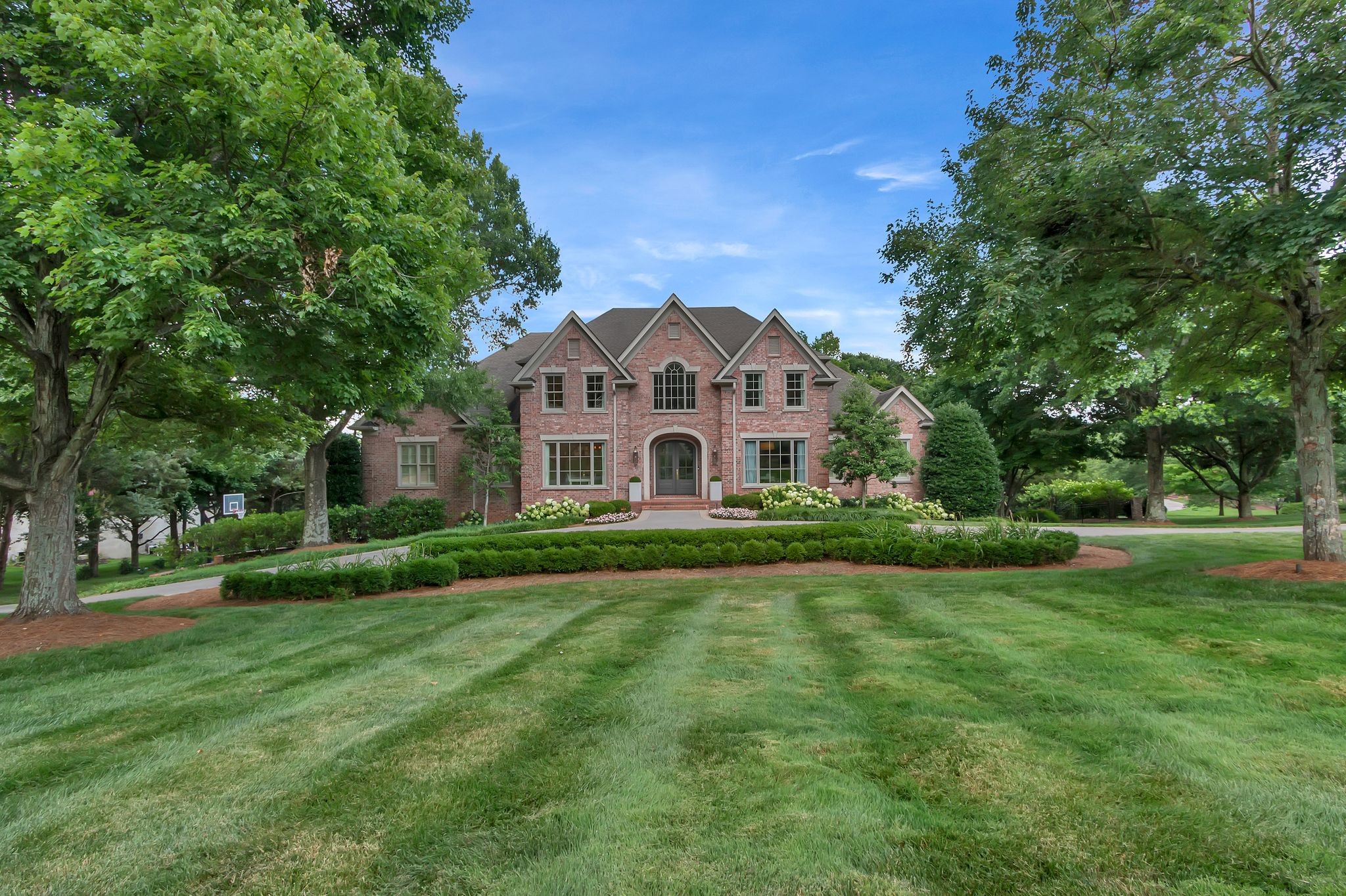 Welcome to this exceptional 5 bedroom, 6 full bath and 2 1/2 baths estate nestled on a beautifully manicured one-acre lot. Showcasing timeless architecture and thoughtful updates throughout. This home features a gorgeous gourmet kitchen, new updated designer light fixtures, and a fully updated primary bathroom retreat. Abundant storage throughout, including dedicated spaces for a media room, kids playrooms, workout room and multiple additional storage areas. The outdoor living area is just as impressive, boasting a spacious turfed-in field area, a sparkling saltwater pool, and plenty of room to entertain or relax in your private backyard oasis. With new energy-efficient windows installed in 2023 and meticulous attention to detail, this home is truly move-in ready.