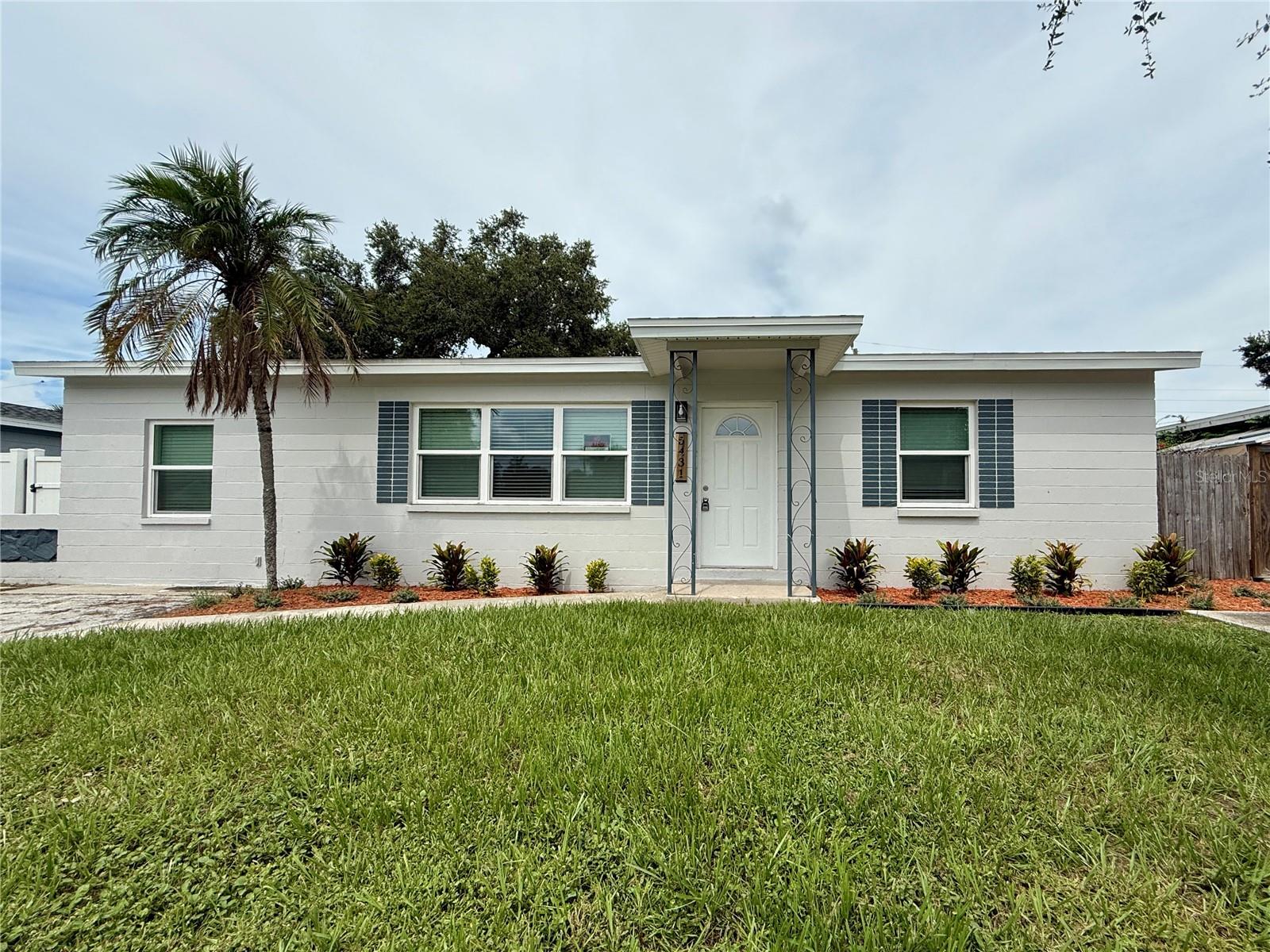 This beautifully renovated single-family home blends style, function, and convenience. Featuring 3 bedrooms, 1 full bathroom, a dedicated office, and an inviting Florida room with abundant natural light, this home offers flexible living spaces with endless potential. The stunning kitchen, complete with a floor-to-ceiling pantry, flows seamlessly into the dining area—perfect for both everyday living and entertaining.
Enjoy the practicality of two driveways, a newer roof (2019), hurricane impact windows, and an interior laundry room. Step outside to a generous backyard ready for your personal touch.
The central location of this home offers unmatched convenience—just minutes from pretty much everything! This home is move-in ready and packed with thoughtful upgrades throughout.