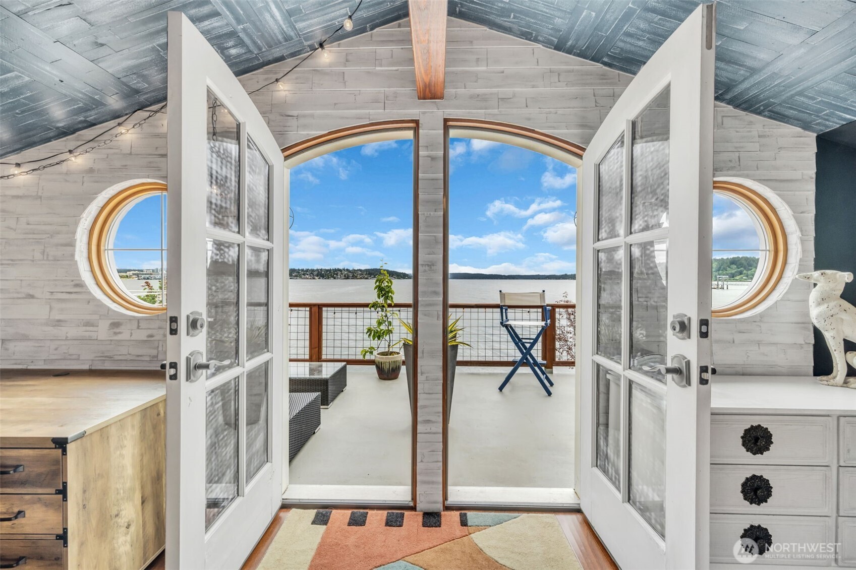 Experience year-round waterfront living in this fully rebuilt Sinclair Inlet home showcasing custom craftsmanship & design. Watch ferries, naval ships & Friday-night sailboat races & enjoy downtown’s farmers market & cafés just a short jaunt away. In Summer, watch the Bridge Blast fireworks from the deck or cast for salmon at the waters edge. Inside, a chef’s kitchen features a copper farmhouse sink, commercial gas range & vintage flattop griddle; spa-style baths include a steam shower & large 8-head shower in primary. Built w/ energy-efficient SIPs panels & engineered stem walls, plus EV & hot-tub wiring, this waterside retreat pairs coastal charm w/ enduring quality. Seller is moving out of country for work & motivated to find right buyer