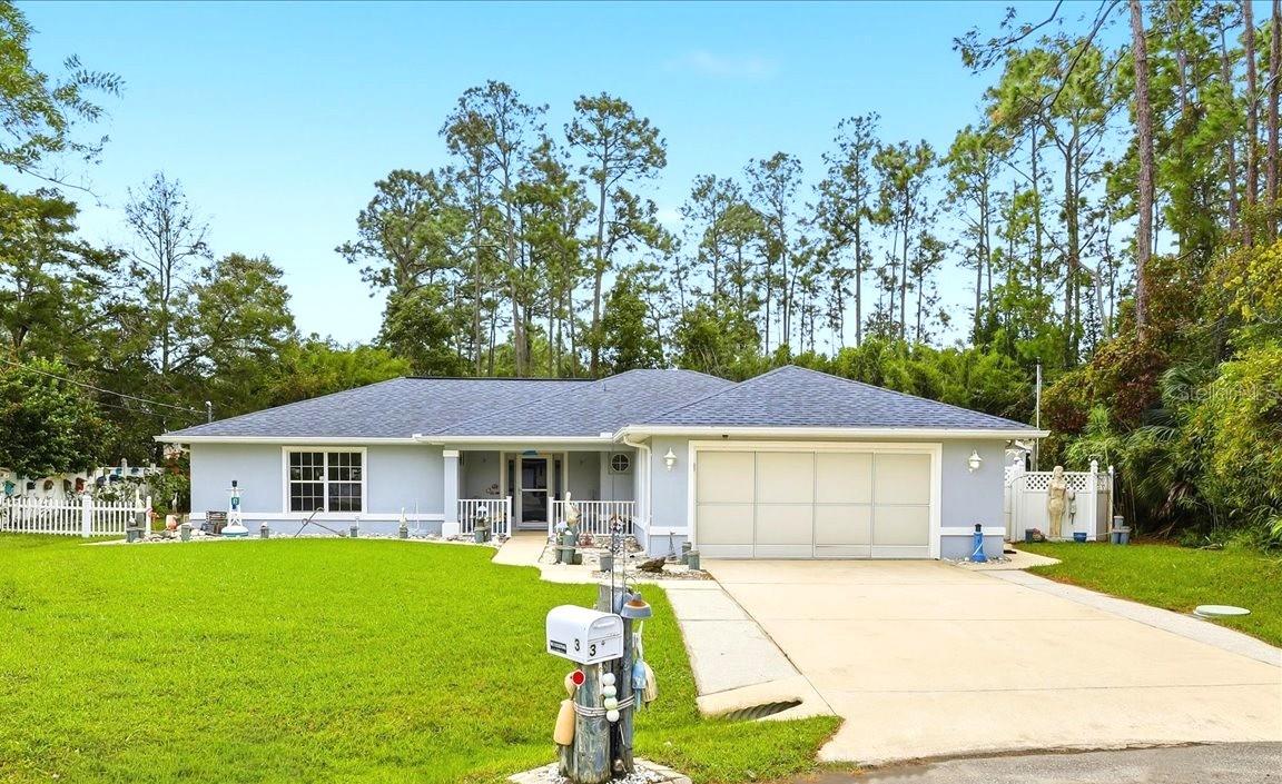 Your must-see private Coastal retreat awaits on an oversized cul-de-sac lot backing to a reserve! Located at 3 Rymm Pl, this home offers a spacious private backyard with room for a potential pool. The large, enclosed Florida room provides inviting space to relax, entertain, and enjoy views of the private yard. Inside, vaulted ceilings create an open, airy feel, complemented by whole house plantation shutters, ceiling fans, and a charming kitchen bay window. All interior walls are insulated to help reduce sound transfer between rooms while providing energy savings. The roof was replaced in 2021 including a peel-and-stick underlayment for extra protection. Sidewalks surrounding the home provide convenient access around the property. The oversized two-car garage features a screened enclosure, while the included 12-by-16-foot Tuff Shed with electricity, matching shingles and a workbench provides additional storage and hobby space. Don't miss out on seeing this private Florida retreat! Come experience the spacious Florida room, secluded backyard, and see all the possibilities!