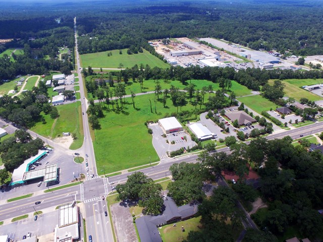 Excellent location for a professional office/medical office or other mixed use commercial.  Two joining lots being sold together totaling .99 acres.  All utilities , common storm water facility, level, ready to build.  Restrictions apply.