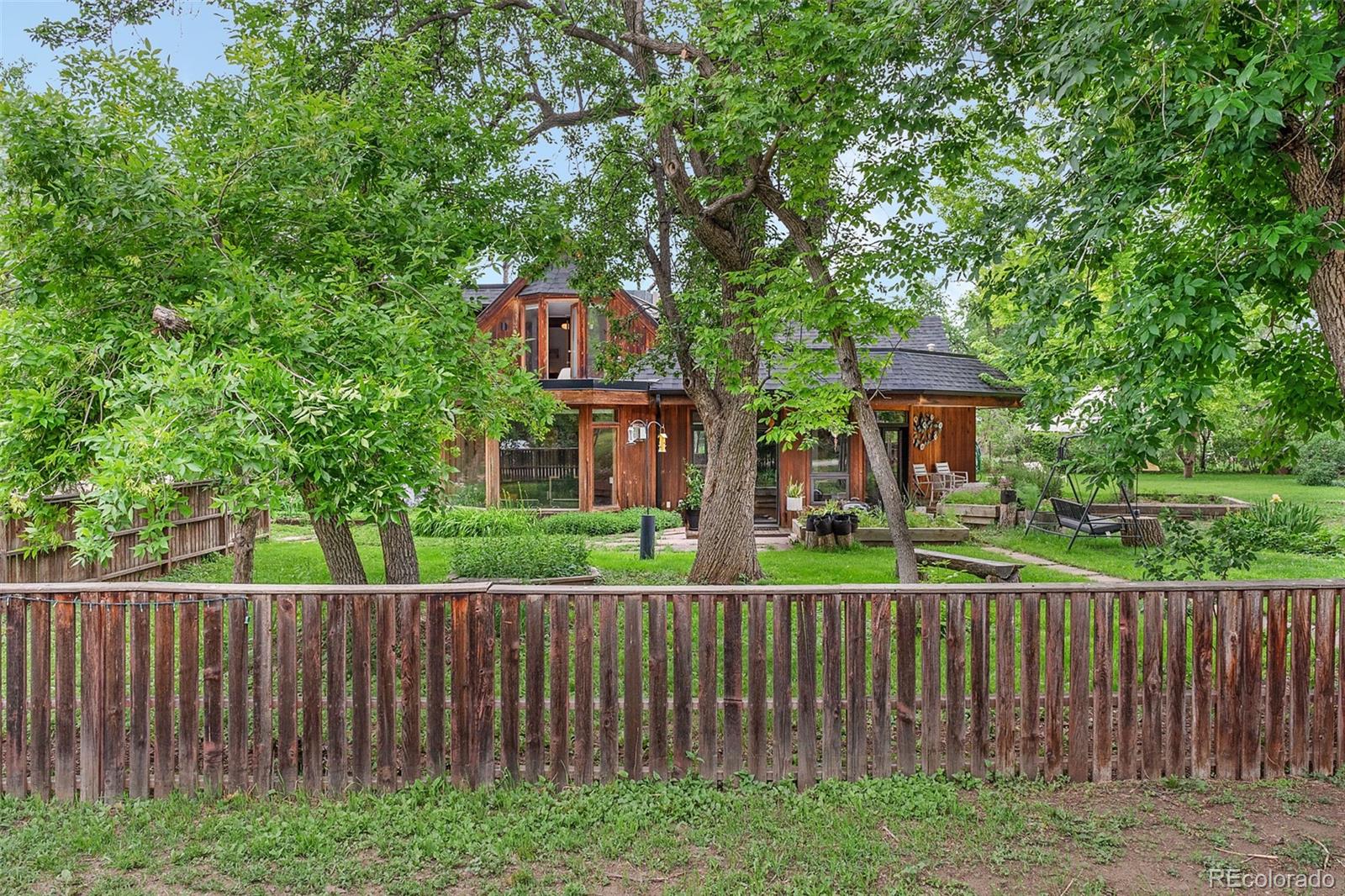 1468 Cherryvale Rd offers a rare opportunity to own a truly distinctive home in one of Boulder’s most desirable residential areas where space, character, and convenience come together seamlessly. Set on a generous 1.27-acre lot, this property provides a sense of openness and breathing room that is increasingly hard to find.At the heart of the property is a home filled with character, history, and timeless appeal. Originally constructed in 1900, it offers a distinctive architectural presence that stands apart from more conventional homes. Subtle hints of its past remain throughout, creating a space that feels both authentic and livable. The result is a home that not only tells a story but also provides comfortable, functional living designed for today’s lifestyle, making 1468 Cherryvale Rd truly one of a kind.Inside, the home is inviting and full of natural light, with a layout that encourages both everyday living and easy entertaining. The living spaces feel open yet cozy, with large windows that frame the surrounding yard and bring the outdoors in. It’s a home that feels lived-in in the best way welcoming, character-filled, and full of possibility.The expansive lot enhances the experience of the home, offering ample space to garden, relax, or simply enjoy the privacy and openness around you. Mature landscaping combined with open areas creates a balanced setting that feels peaceful without being isolated.Located in a well-established area with neighboring homes, the property offers a sense of community while still providing room to spread out. With convenient access to Boulder’s amenities, schools, and outdoor recreation, this location supports both an active and comfortable lifestyle.1468 Cherryvale Rd is more than just a home it’s a piece of local history, thoughtfully adapted for modern living, and a rare chance to own something truly unique.