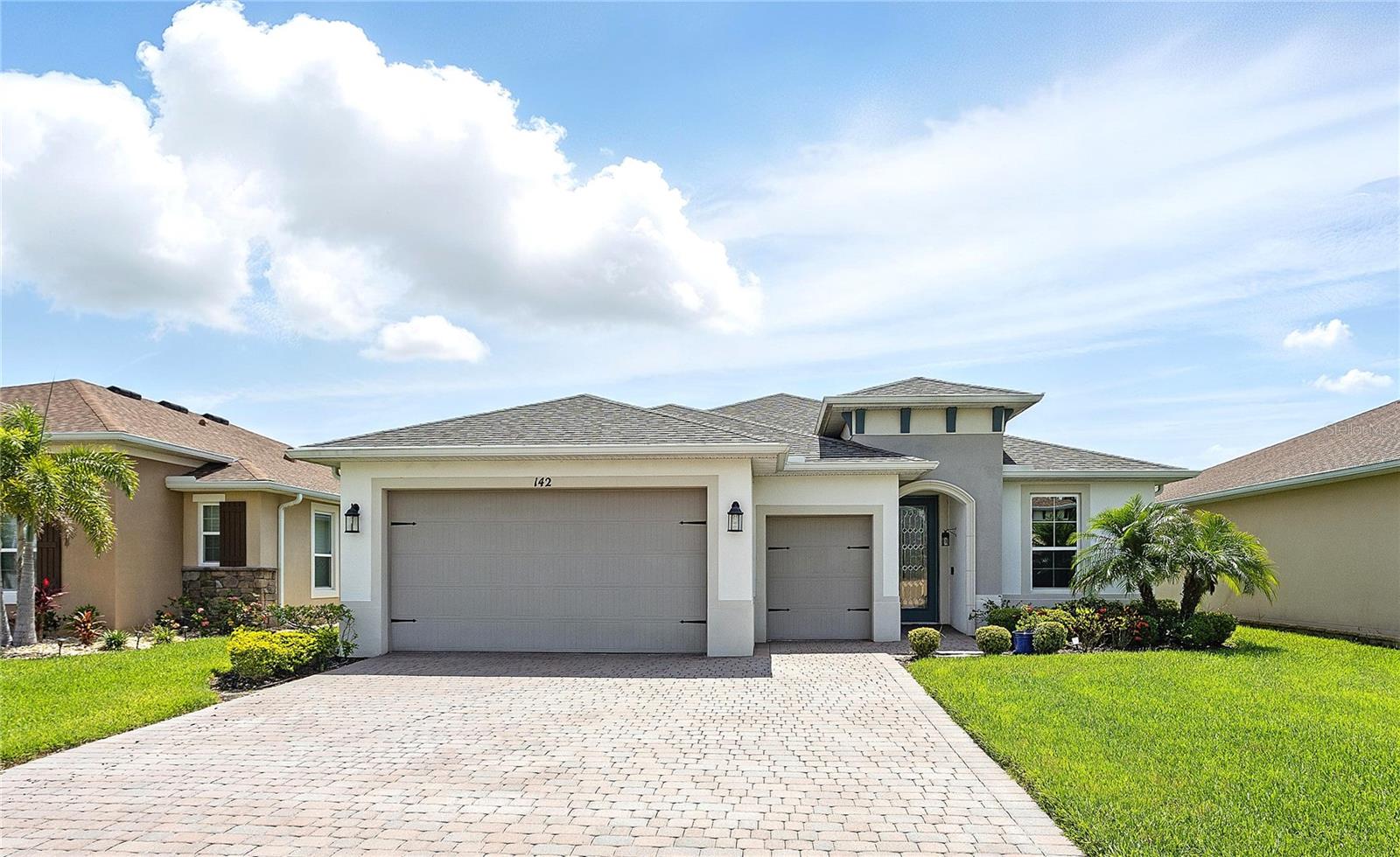 Welcome to 142 Olympus Way, in the highly desirable 55-plus gated community of Solivita. This beautifully maintained single-family home features three bedrooms, three baths and a spacious open-concept layout ideal for comfortable living and entertaining. Enjoy a modern kitchen with updated appliances, a generous two primary suites with walk-in closets, and a private backyard ideal for relaxing in the Florida sunshine. Solivita offers resort-style amenities including golf courses, pools, fitness centers, pickleball courts and over 200 social clubs. Conveniently near Cypress Parkway with easy access to Orlando and Tampa. Experience active adult living at its finest in this move-in-ready home. Association recreation - lease, deed restrictions, fitness center, gated community, golf carts OK, golf community, handicap modified, irrigation-reclaimed water, park, playground, pool, sidewalk, special community restrictions, tennis court(s) and wheelchair access.