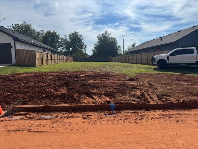 Wonderful opportunity to purchase an affordable lot that is situated between 2 nice  homes built in 2024.  and  just a few minutes from Downtown OKC. and OU Medical Center.   Lot is 50X140 sf and fenced on each side with  newer stockade fencing.   .