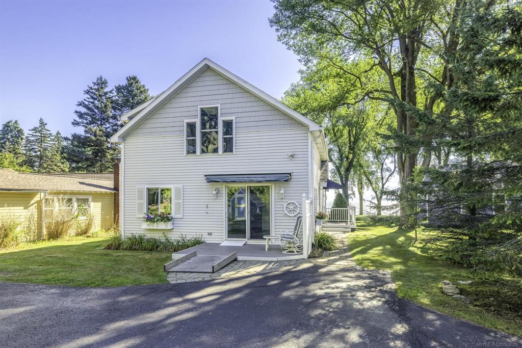 LEXINGTON: Welcome to 8195 & 8193 Lakeshore Road (2 HOMES)! Enjoy the best of Everything - a PRIME Lexington, MI location on a Walk-out Sandy Beach with a MAIN HOME & a GUEST HOME on this beautiful Lake Huron parcel! MAIN HOME (8195 Lakeshore): 3 Bedroom, 2 Baths, 2160 Sq Ft with stunning Lake Huron views! Natural Gas forced air & Central A/C (2 units), Whole House Generator, City Water & more! Enjoy your Lakeside Deck & Patio along with your Beachside Deck at the edge of the SANDY Beach! GUEST HOUSE (8193 Lakeshore): 2 Bedroom, 2 Bath, 1600 Sq Ft with spacious Room Sizes, Natural Gas Furnace & Central A/C, Whole House Generator, city water & separate septic system! Enjoy an Asphalt Driveway with plenty of parking plus a 30'x24' Detached Garage, beautiful Plantings & Flower Gardens, & an 8'x10' Green House! Come experience Lake-Life along Michigan's Stunning ThumbCoast in Lexington!