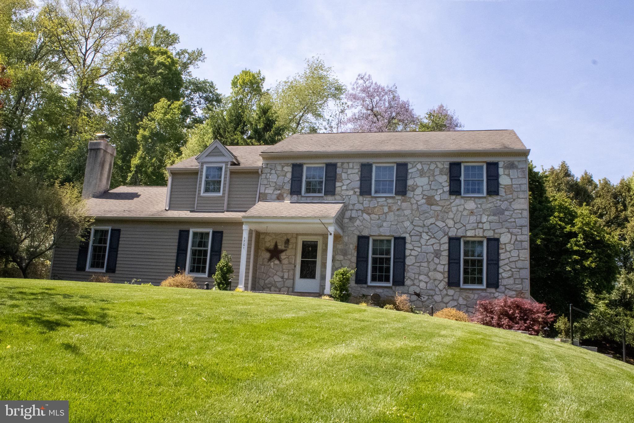 Welcome to a this stately 4 bedroom and 2.5 baths stone Colonial in  Valley Greene neighborhood. Tredyyffrin/Easttown schools! Professionally landscaped exterior and many upgrades on the outside and interior of this wonderful home! Ideally located and close to shops, restaurants, parks and entertainment as well as public transportation.  Paoli train station is minutes away! A 6month young HVAC  system will be a comfort for the new residents of this fine home! The kitchen features Corian countertops,  double sink, built in microwave, warm lighting  and  eat in kitchen. In addition there are mostly stainless steel appliances. A  large family room with a  a rustic flare and gorgeous stone fireplace, is ready to be made into your own cozy den to gather! The  laundry room, powder room, and office are down the hall.  Living and Dining room are ample to allow for more entertaining! Beautiful engineered hardwoods in most of the downstairs and upstairs.  The Pella sliding glass door leads to the multi-level custom made back deck with Octagonal Sitting area  under an impressive Magnolia tree where one can enjoy the privacy and bucolic backyard setting!  Follow the beautiful oak and rod iron banister upstairs to the second  floor where there is a spacious master bedroom with ceiling fan, updated master bath with tile floors, vanity and glass stall shower! In addition there are three other nice sized  bedrooms with good closet space..  The hall bathroom has also been updated and there's a linen closet at the end of the upstairs hall. The windows have also been updated with Energy efficient Anderson Windows. A finished basement that could act as a 5th bedroom with fantastic bar and sink, a full wall of  built in book shelves,  walk in closet and additional storage closets! The location is second to none.  The rails to trails system for getting in your steps, running or biking is adjacent to the neighborhood for easy access to a network of trails. George Lorimer preserve and Airdrie forest preserve East are very close but there are many other open spaces and preserved areas as well as Valley Forge National Park within a short drive for more nature and outdoor enjoyment!  The King of Prussia mall and easy access to commuter routes are other highlights of this wonderful and convenient location.