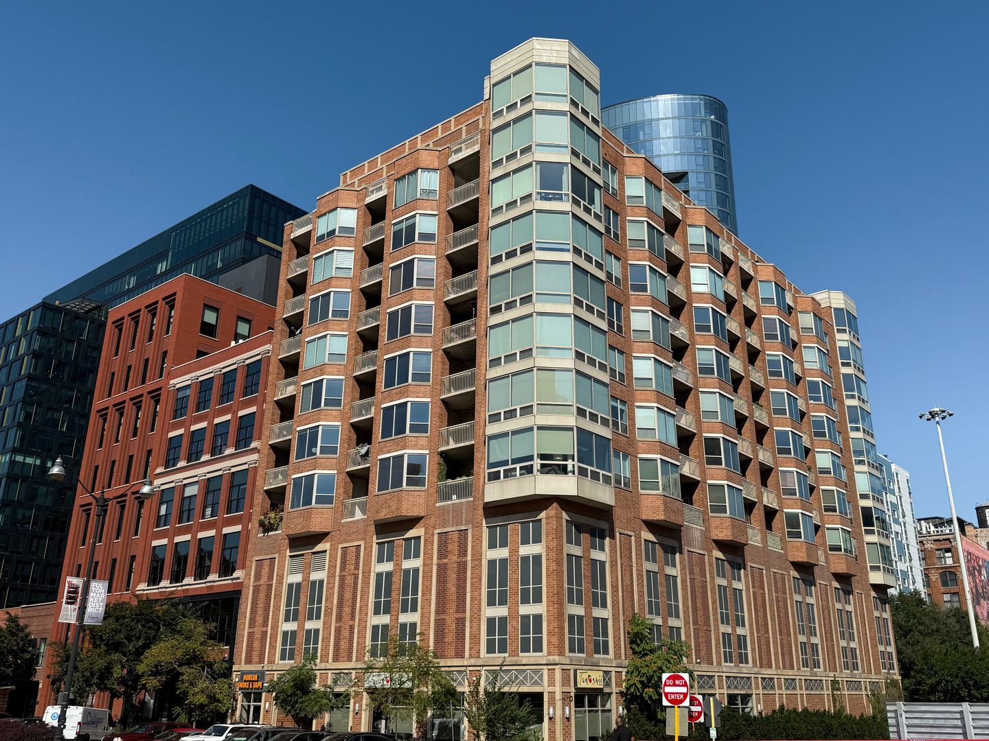 Enjoy luxury living with LOW HOA in this spacious 2 bedroom, 2 full bath + DEN in the heart of the West Loop! This beautiful home features updated floors and a new Trane HVAC system installed in 2024. The kitchen is designed for both style and function with maple cabinets, stainless steel appliances, granite counters, breakfast island, and an RO system for purified water on tap. Recent upgrades include a new microwave (2024), washer (2024), and French door refrigerator (2024). The open living/dining room is bright and inviting-perfect for entertaining. An oversized primary suite offers a custom walk-in closet and a spa-like bath with dual vanity, walk-in shower, soaking tub, and linen storage. You can easily fit a king size bed AND a full-size office table! Enjoy gorgeous city views from your own private balcony directly off both the primary bedroom and living room. The second bedroom is also generously sized, complete with custom closet and its own private balcony, ideal as a guest room, nursery, or home office. A second full bath with shower/tub sits nearby. The den also offers a great flex space to fit your needs. Additional highlights include a private in-unit laundry room with extra storage, coat closet, an oversized storage cage (1 of only 10 in the building), and closets with mirrored sliding doors.  This well-managed, pet-friendly building also offers top-notch amenities: updated lobby, secure mailroom, dual elevators, ButterflyMX security system, brand-new fitness center with hospitality area, yoga room, bike storage, and heated garage parking. Unbeatable West Loop location-steps to Restaurant Row (right across the street from Au Cheval), nightlife, Whole Foods, Mariano's, CTA Green & Pink Lines, and quick access to 90/94. Heated garage space ($25K value) is INCLUDED in the price! Agent Owned.