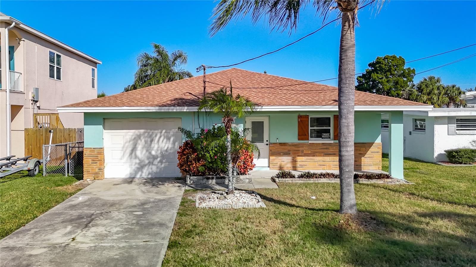 Short Sale. Wake up to serene water views in this beautifully renovated 2-bedroom, 2-bath waterfront home that blends modern comfort with relaxed coastal living. Completely updated from top to bottom, the home features an open-concept layout, stylish finishes, and abundant natural light throughout. The modern kitchen flows seamlessly into the living and dining areas, perfect for everyday living or entertaining. Both bedrooms are generously sized, with updated bathrooms. Step outside to enjoy peaceful water views and direct gulf access, ideal for morning coffee, sunset evenings, or weekend relaxation. This move-in-ready waterfront retreat offers the perfect balance of style, comfort, and location.