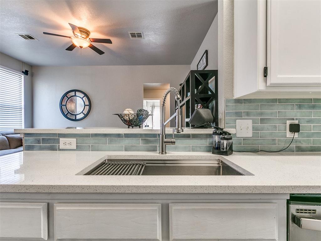 **Seller is offering $2,000 towards buyer's closing costs!** Welcome home to this beautifully updated 3-bedroom, 2-bath traditional-style home offering timeless charm with modern comfort. Step inside to find rich wood floors, fresh interior paint, and a warm, inviting layout with two living areas that’s perfect for everyday living or entertaining.  The fully updated kitchen features sleek countertops, contemporary cabinetry, and stainless steel appliances, opening seamlessly to the dining and living areas. Both bathrooms have been tastefully renovated, offering a fresh, modern feel with quality finishes throughout.  The spacious primary suite includes a private bath and generous closet space. Additional highlights include a 2-car garage with an in-ground storm SHELTER for peace of mind during Oklahoma weather & a 2 year old CLASS 4/IMPACT RESISTANT SHINGLE ROOF.  Out back, enjoy your own private retreat with a large fenced yard and an above-ground salt system swimming pool—perfect for summer gatherings and fun.  Conveniently located near schools, shopping, and easy highway access, this move-in ready home truly has it all!  Ask your Realtor for a full list of items that have been upgraded!!