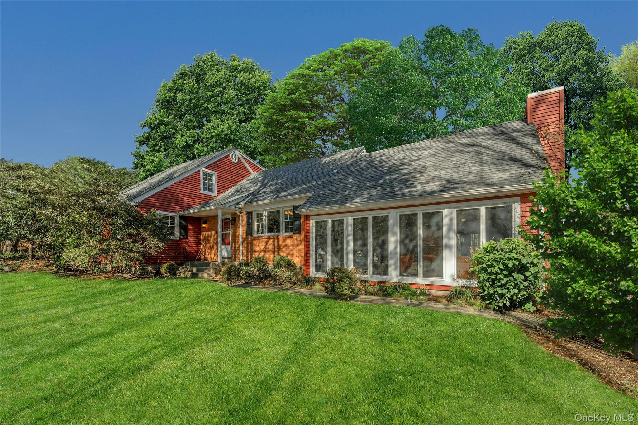 Welcome to Katonah Ridge! This 4-bedroom, 3-bath former model home offers space, charm, and great value. With two primary suites (including one on the first floor), it’s perfect for flexible living.

Enjoy a sunny eat-in kitchen with pond views, a bright family room with fireplace, and a screened porch overlooking the backyard. Formal living and dining rooms add room to gather, while the upstairs suite features vaulted ceilings and hardwood floors beneath the carpet.

Lovingly maintained by only its second owner, this home represents a rare opportunity in a sought-after community, offering the chance to personalize and expand if desired. Just minutes to downtown Katonah’s shops, dining, schools, and train station, it’s the perfect combination of convenience and neighborhood charm.