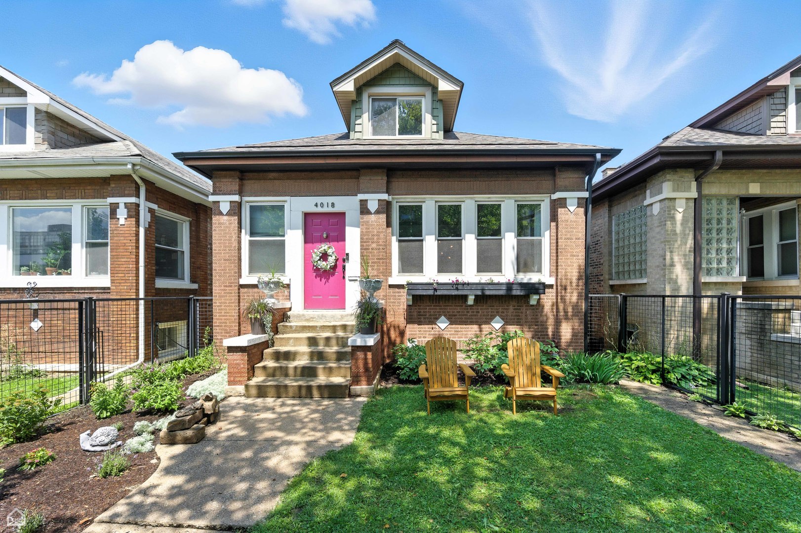4K DRONE WALK THRU VIDEO ON ADDITIONAL INFO TAB.  Oversized Chicago bungalow on a 30-foot-wide lot.  Which has that vintage feel you love but with today's modern amenities.  The first floor features an expansive, open family room with an original fireplace and stained glass.  The wall of south-facing windows brings in tons of light, not only filling the family room but also the attached dining room.  You have 3 full-size bedrooms on the first floor, a renovated bathroom, plus a modern kitchen with newer cabinets, appliances, countertops, and backsplash. The 1st floor is finished off with a large walk-in pantry and an office.  The top floor features a massive master suite that can be kept as one or easily divided into two separate bedrooms.  The top floor features a split-system air conditioning system and a newly renovated bathroom.  The lower-level features radiant heat throughout the floors, a full wet bar, a large family room perfect for big gatherings, laundry facilities, and a full bathroom.  RECENT UPGRADES - 2024 both house and garage roof, fence 2022, AC upstairs 2021, furnace/water heater 2017, kitchen appliances 2023.  Steps to Cermak Produce grocery, Binny's Logan Square, Kosciuszko Park/Pool, BrewBrew Coffee Shop, and Planet Fitness. Easy access to the Logan Square and Belmont Blue Line stops, the Healy Metra MD-N line, 90/94, and downtown CTA bus lines.