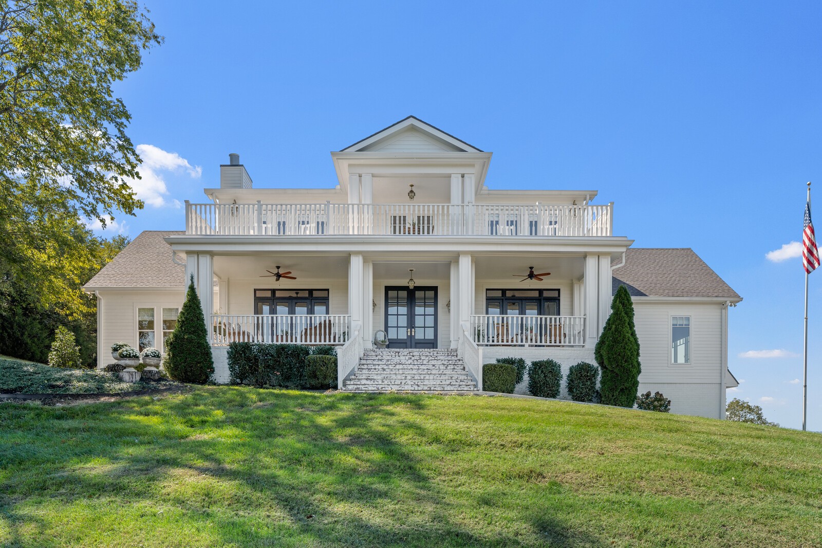 Perched gracefully on a rise that overlooks the rolling hills of Williamson County, Idlewild is not simply a home — it is a destination. This five-bedroom, four-and-a-half-bath estate has been meticulously renovated and reimagined into a retreat where timeless design, pastoral beauty, and modern comfort converge. An idyllic drive carries you past serene fenced pastures, a charming barn, and the natural beauty that defines this corner of Tennessee. What awaits at the top is nothing short of exceptional — a stately residence that blends the romance of a country homestead with the refined detail of a curated designer showcase. Under the creative direction of Kim Leggett — nationally recognized author, curator, and the owner of City Farmhouse — this residence has been transformed into a living work of art.

Throughout the residence, carefully curated choices elevate every room. European lighting fixtures not only illuminate but also serve as sculptural art pieces. Walls are dressed in rich designer wallpapers and paints, chosen to highlight the home’s architecture and create distinct moods within each space. Functional kitchen with zelige tile, antique center island table and La Cornue stove The primary suite offers a private sanctuary, where design choices create an environment of relaxation and indulgence. Expansive windows frame serene views of the surrounding landscape, reminding you that this is a home deeply connected to its setting. The luxury hotel-inspired bathroom includes exquisite tile work, custom sinks, and fixtures chosen for both their beauty and enduring quality. Guest rooms carry forward the same level of intention. No corner of Idlewild feels like an afterthought; instead, each space has been curated to delight and welcome. With five bedrooms and 4.5 baths, there is ample room for family and guests alike.

Enjoy time outside, entertaining guests with your own pickle ball court, cocktail pool and multiple outdoor spaces. This home is a must see.
