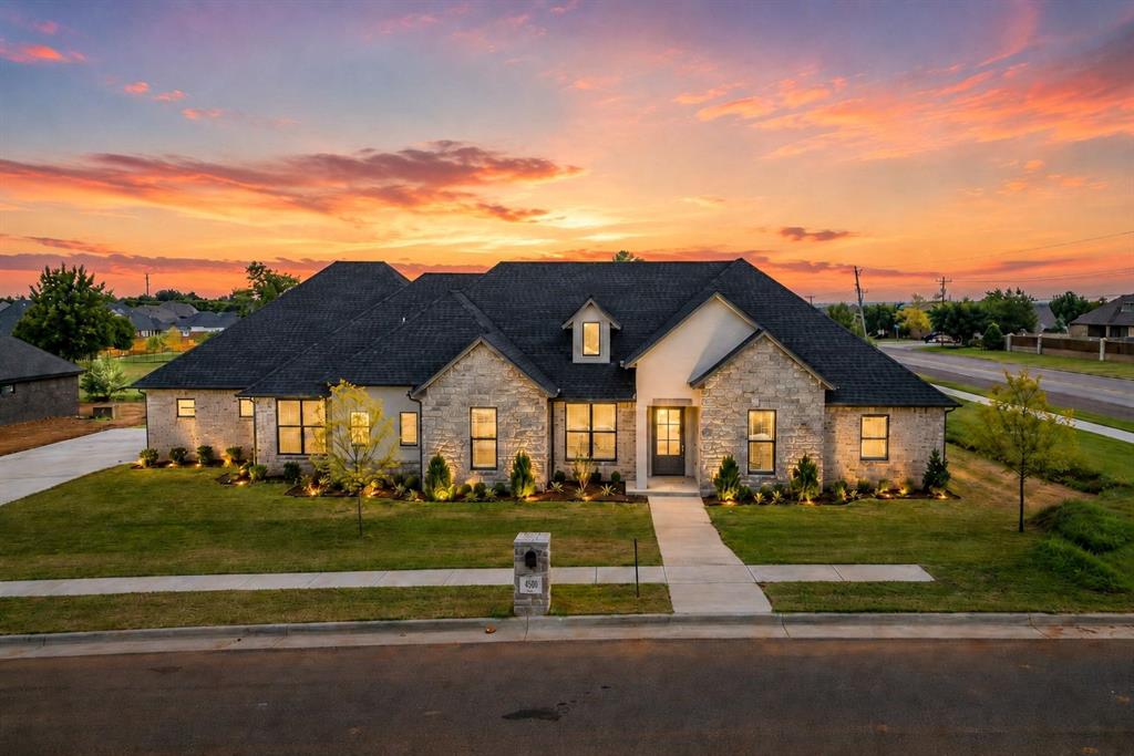 $10,000 Builder incentive to use towards rate buy-down, closing costs, or pre-paids! Located in a shop approved community! Luxury, comfort, and thoughtful design come together perfectly in this newly constructed home located in the highly desired Hills of Timber Creek community. Offering 3,524 square feet of bright living space, this stunning home offers 4 spacious bedrooms, 3.5 bathrooms, and an additional media/theater room. Perfect for movie nights, game days, or entertaining family and friends. This home is a real eye catcher with white oak hardwood floors, timeless designer finishes, and an open layout designed for comfortability and functionality. The kitchen is a true showpiece, featuring quartz countertops and a premium Frigidaire Professional appliance package, including a side-by-side refrigerator and freezer. Outside, you'll enjoy a covered patio overlooking the fully fenced backyard, complete with full irrigation, gutters, and blinds already installed, while an above-ground storm shelter offers added peace of mind. All of this located in Moore school districts, roughly 20 minutes away from downtown Oklahoma City, Tinker AFB, and Norman. This show stopping home is where timeless design meets luxurious comfort.
