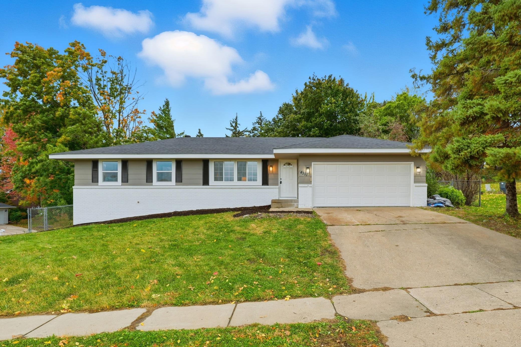 Welcome Home. A stunning remodeled single-family home in West Bloomington. Everything is brand new. This includes the roof, windows, furnace, air conditioning, flooring, millwork, lighting, hardware, quartz tops, garage door systems and stainless appliances.  Additional features include a newly constructed custom shiplap in the main living room, a newly built deck, and a color scheme that flows both inside and out.Nestled on this corner lot the walk out rambler is the perfect combination of price meets location.