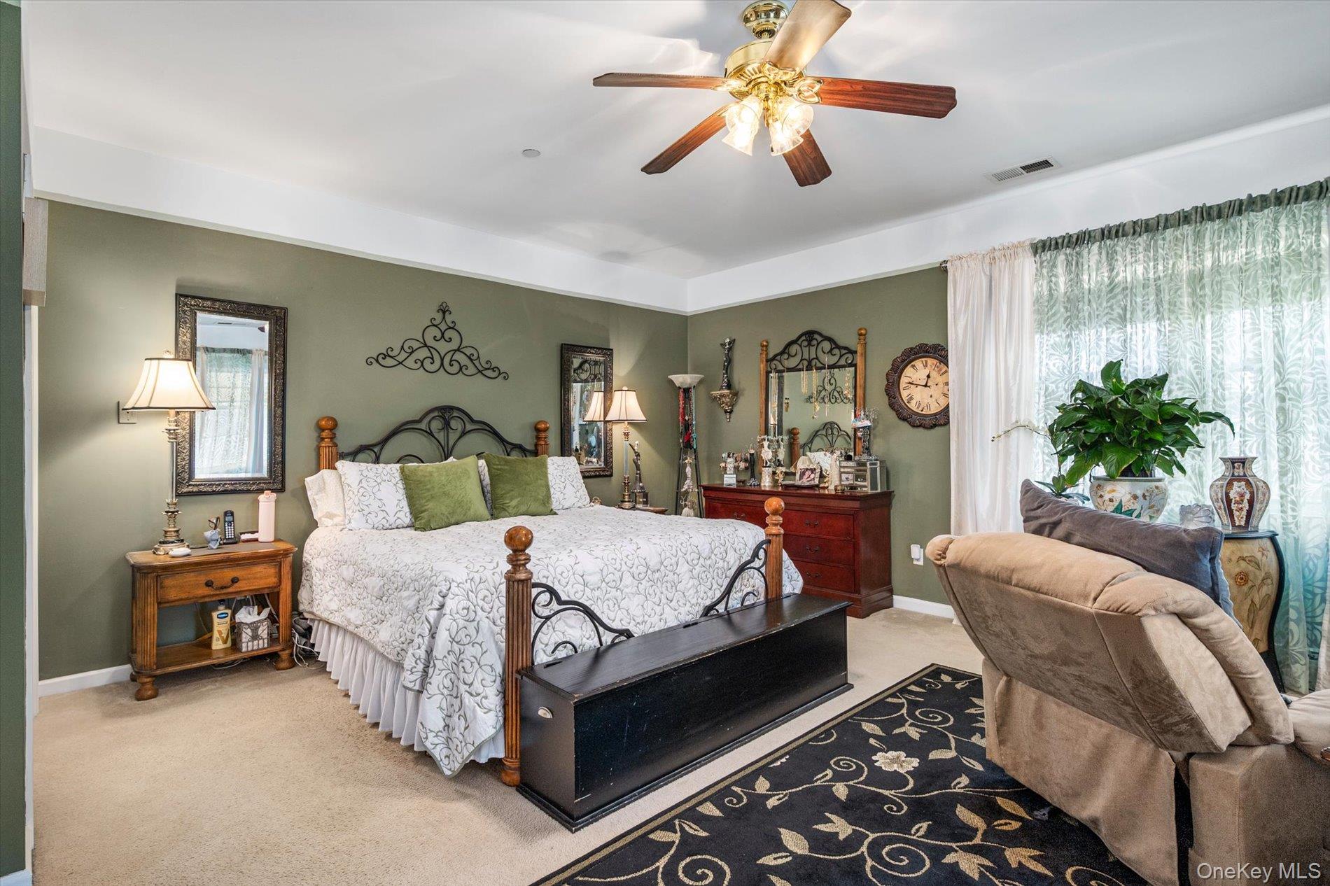 Welcome to easy, low-maintenance living in this desirable 55+ community! This beautifully maintained 2-bedroom condo offers a spacious and comfortable layout, highlighted by an oversized primary bedroom that provides plenty of room to relax and unwind.  Enjoy a bright and inviting living room and separate dining area, perfect for both everyday living and entertaining. The updated kitchen features modern finishes and is designed for both style and functionality. A full bath completes the well-appointed interior.Ideally situated above the clubhouse, this unit offers unmatched convenience just steps away from social activities. Step outside to your private patio which is the largest in the entire community perfect for relaxing, entertaining, or enjoying the outdoors.  A perfect blend of space, convenience, and lifestyle this is the one you’ve been waiting for!