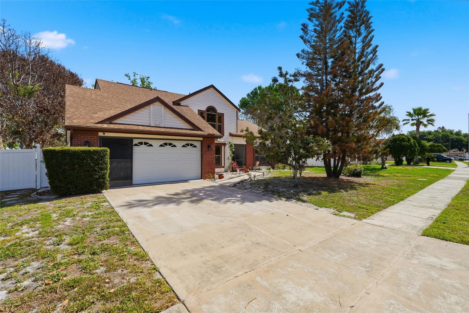 LOCATION, LOCATION, LOCATION! ROOF 4-5 YEARS OLD, AC 8-9 YEARS, WATER HEATER 2-3 YEARS OLD. Welcome to this beautiful home in the desirable Whisper Lakes community of Orlando, in the Hunter's Creek area! This spacious residence offers the perfect blend of comfort, functionality, and peace of mind with a newer roof and a thoughtfully designed layout. Step inside to discover an inviting floor plan ideal for both everyday living and entertaining. The heart of the home features a gorgeous renovated kitchen with updated cabinets and sleek countertops, creating a clean space that truly stands out. The primary bedroom is conveniently located on the first floor, offering both privacy and ease of access. Complementing this retreat is a beautifully renovated primary bathroom, designed with style and comfort in mind. Upstairs, the remaining bedrooms provide the perfect separation for family or guests. Situated in a well-established neighborhood, this home combines charm, practicality, and an unbeatable location. Just minutes from major highways, shopping, dining, and world-famous attractions, this property delivers both comfort and convenience in one of Central Florida’s most sought-after areas. Offering a lender credit towards closing costs or interest rate buy-down when client uses the preferred lender ACE Lending Group. ASK ME HOW?!