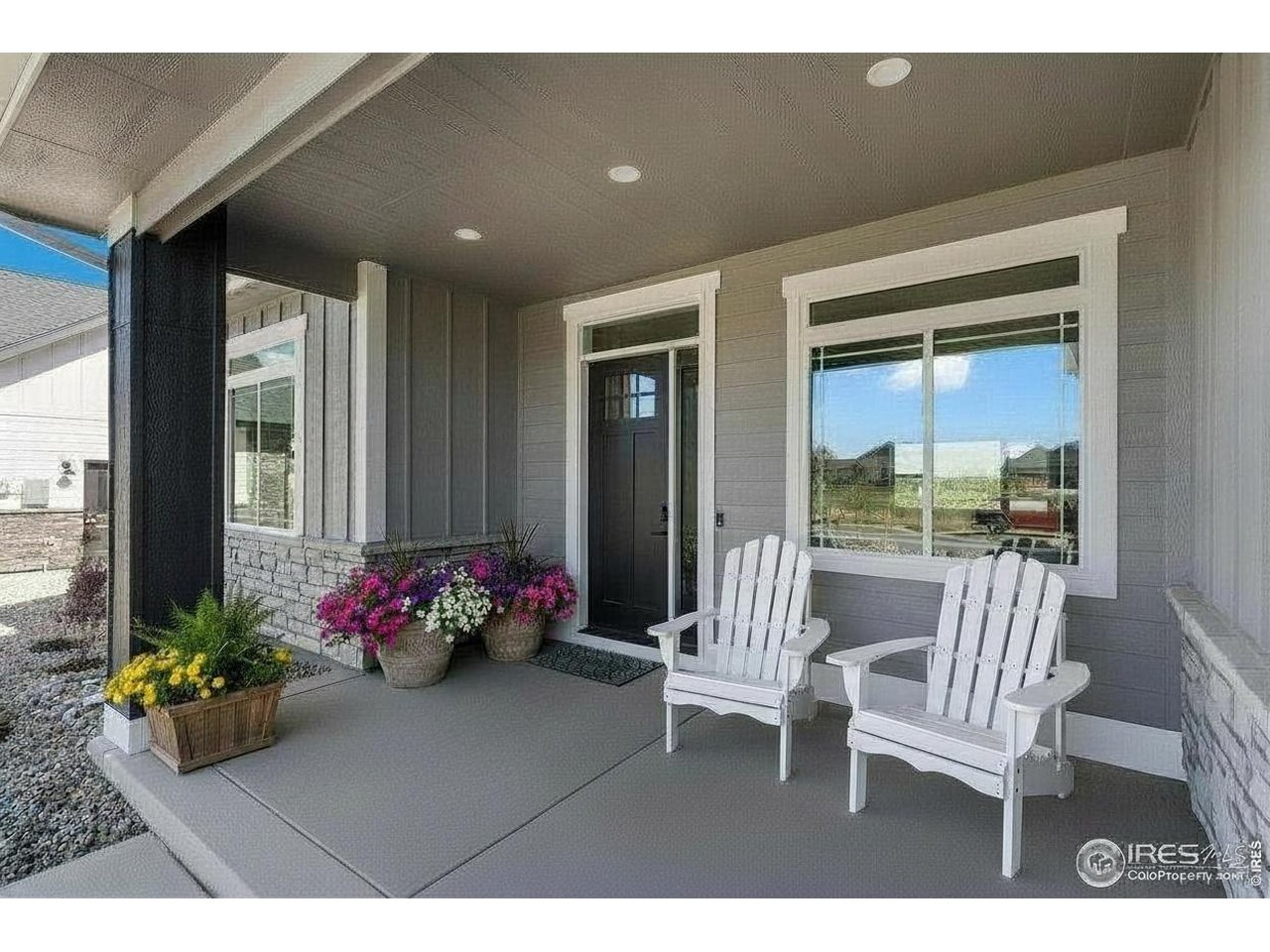 Welcome to The Remington by Pagel Contracting. Meticulously crafted ranch home in Berthoud's premier Harvest Ridge neighborhood. With too many features to list, this one deserves an in-person showing. Soaring 10' ceilings and abundant windows fill the great room, kitchen, and dining area with Colorado sunshine, while a floor-to-ceiling tiled LED fireplace anchors the space as its natural focal point. The kitchen is built for both everyday living and entertaining: custom cabinets extend to the ceiling for maximum storage, recessed lighting and thoughtfully placed appliances keep the design sleek, and the oversized quartz island offers generous workspace plus pop-up outlets for effortless device charging. Don't miss the hidden walk - in pantry tucked just out of sight. The primary suite features a custom board-and-batten accent wall and a spa-inspired 3/4 bath with a poured-pan shower, bench seating, motion-sensor toe-kick lighting, backlit mirrors, and linen cabinet. Four additional bedrooms - two on the main floor and two in the basement - provide space for family, guests, or a home office.Downstairs, a custom wet bar sets the stage for entertaining, complemented by expansive storage throughout the basement.Built for comfort and efficiency, the home features a high-efficiency heat pump, a tankless water heater with recirculating line, and smart LED lighting controllable by wall switch or smartphone app. Complete front and back yard landscaping means you can start enjoying Colorado living right away - including mountain views from the covered patio.