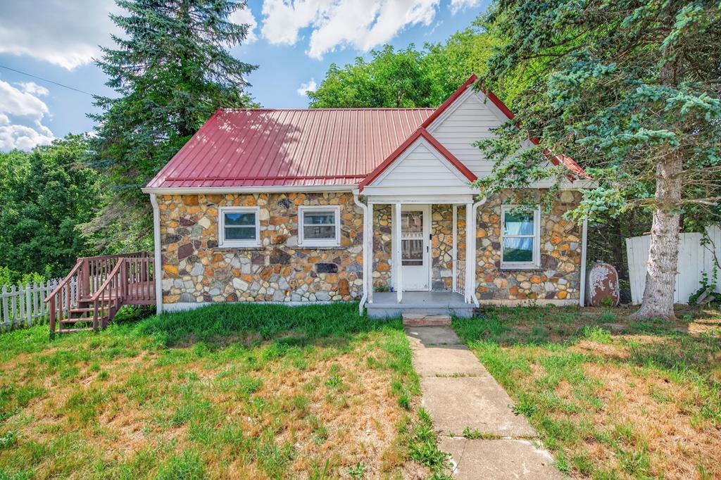 Beautiful home conveniently located in close proximity to the New River and New River Trail. The town is blessed with a rich cultural heritage, abundant wildlife, breathtaking scenery, and endless recreational activities. This home features a metal roof, hardwood floors throughout the main level, unfinished basement, beautiful walk-in tiled shower, a super energy efficient HVAC system, major appliances, fenced in front yard, and much more. New paint, flooring, and fixtures!