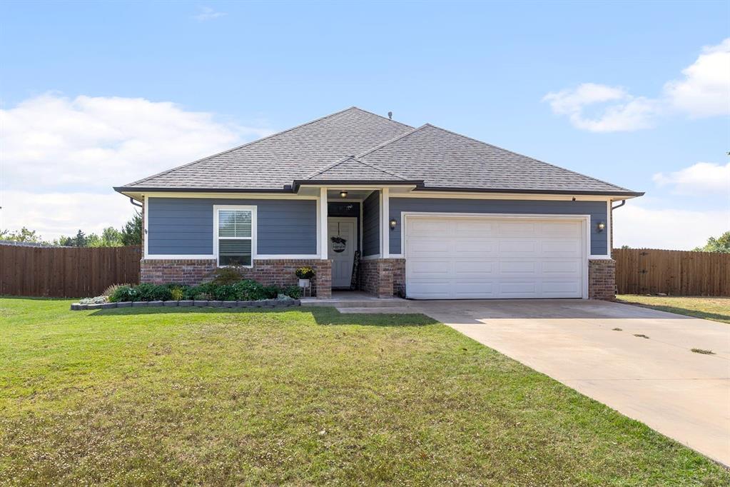 Welcome to this BEAUTIFUL MODERN FARMHOUSE, located in the highly sought-after DEER CREEK SCHOOLS district! With 4 BEDROOMS, 2 BATHS, a STUDY, and a roomy 1/3 ACRE LOT - this home is JUST PERFECT FOR LARGE OR GROWING FAMILIES! From the moment you arrive, you’ll appreciate the FANTASTIC CURB APPEAL and welcoming front yard. Step inside to discover a BRIGHT, OPEN LIVING AREA designed for both comfort and style. COOL, NEUTRAL COLORS pair beautifully with LARGE WINDOWS that fill the space with natural light, while DURABLE FLOORING makes it perfect for everyday living. The LIVING ROOM flows effortlessly into the GORGEOUS KITCHEN, featuring GRANITE COUNTERTOPS, a LARGE CENTER ISLAND, BREAKFAST BAR, crisp WHITE CABINETRY, and a convenient PANTRY for extra storage. The dedicated OFFICE or Flex room highlights a chic FAUX BRICK ACCENT WALL, adding warmth and character to your space. The PRIMARY SUITE is your private retreat—complete with a SPACIOUS BEDROOM and a sliding BARN DOOR leading into the ENSUITE BATH. You’ll love the DOUBLE VANITY, WALK-IN CLOSET, and beautifully tiled shower that combine comfort with style. Secondary bedrooms are generously sized, perfect for family, guests, or hobbies, with a full bath nearby. Don’t forget the roomy GARAGE for storage and convenience. Step outside to your FULLY FENCED, MASSIVE BACKYARD with MULTIPLE GATES—perfect for pets, gardening, or simply enjoying the outdoors. MATURE TREES provide shade, while thoughtful updates like FULL GUTTERS and a NEWLY INSTALLED FLOWER BED add to the home’s charm. This home has been WELL LOVED AND WELL MAINTAINED—now it’s ready for a NEW FAMILY to make memories here. DON’T MISS OUT—SCHEDULE YOUR SHOWING TODAY!