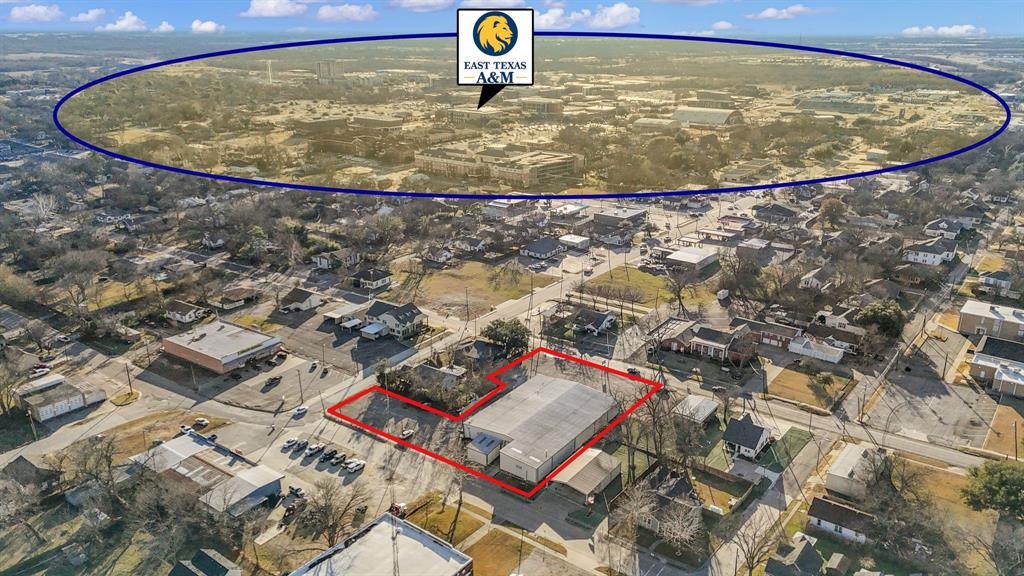 Commerce Texas, walking distance to downtown and down the road from East Texas A&M University! This was once the home of a well established auto mechanic and parts store, and is now available for a new occupant! Property 1.02 acres total, fully paved, and fronts both Washington St, Pecan St, and the rear parking lot also fronts Live Oak St. The building itself is high grade steel frame and steel siding and features 14,512 total sf of insulated shop space, 1,800 of which is finished showroom or retail with customer bathroom. In addition to the showroom there is an office, break room, employee restroom, and storage room. Within the shop area itself are 6 total auto lifts that can remain, 2 12,000lb, 3 9,000lb, and 1 7,000lb. In addition to the lifts are 4 gas commercial heaters, integrated compressed air throughout with 2 commercial IR air compressors, oil storage tanks and separate store room. 2 12ft roll up doors, rear access loading bay.